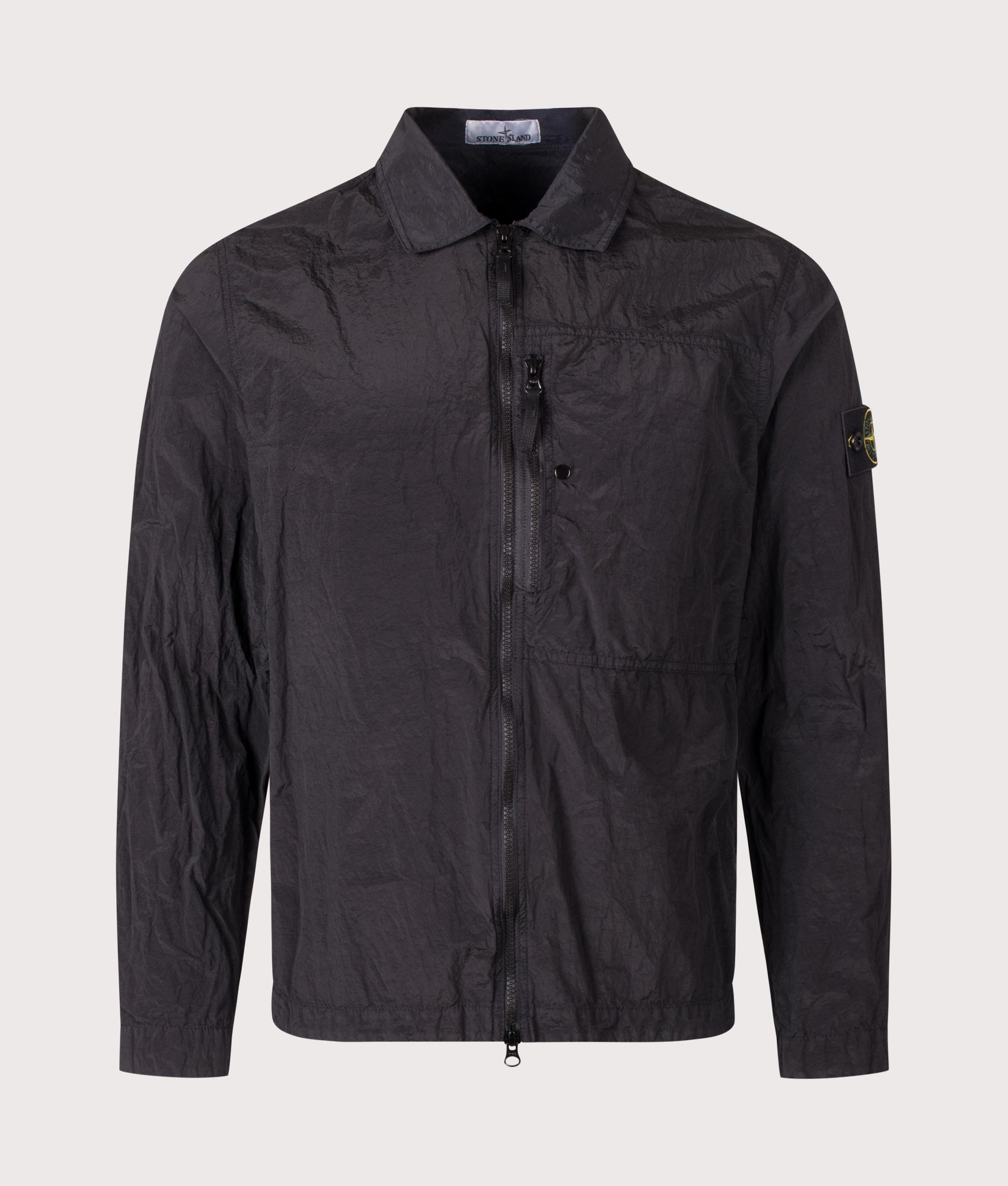 Stone Island Nylon Metal in Econyl® Overshirt in Black at EQVVS Menswear. Front shot.