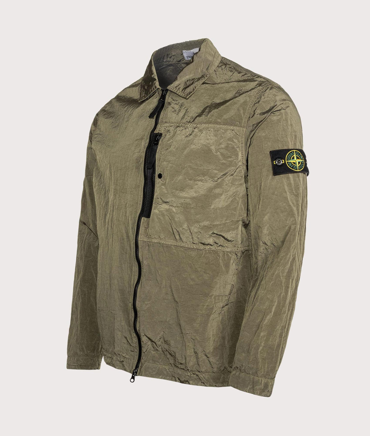 Stone Island Nylon Metal in Econyl® Overshirt in Military Green at EQVVS Menswear. Angled front shot.