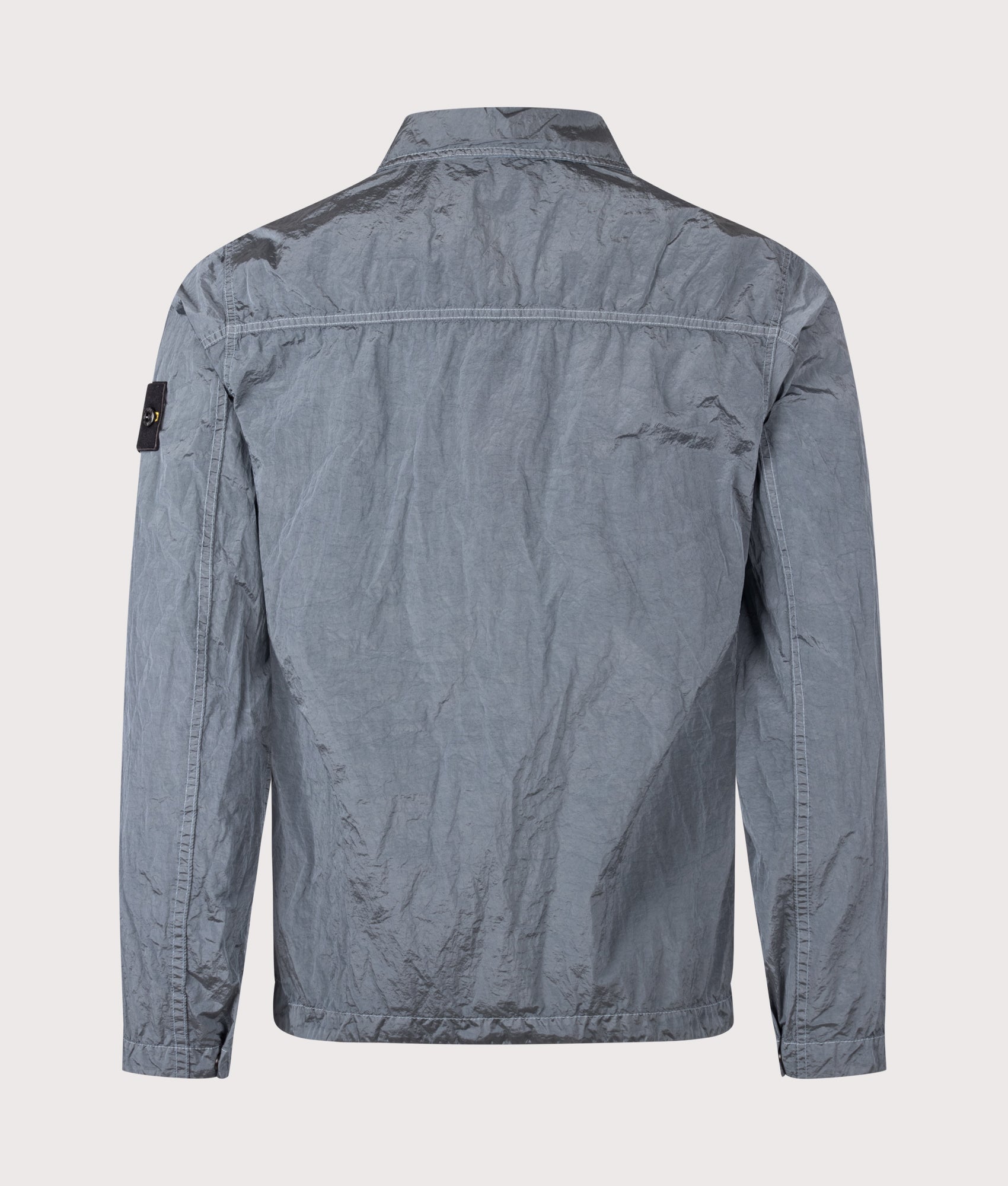 Stone Island Nylon Metal in Econyl® Overshirt in Ash Grey at EQVVS Menswear. Back shot.