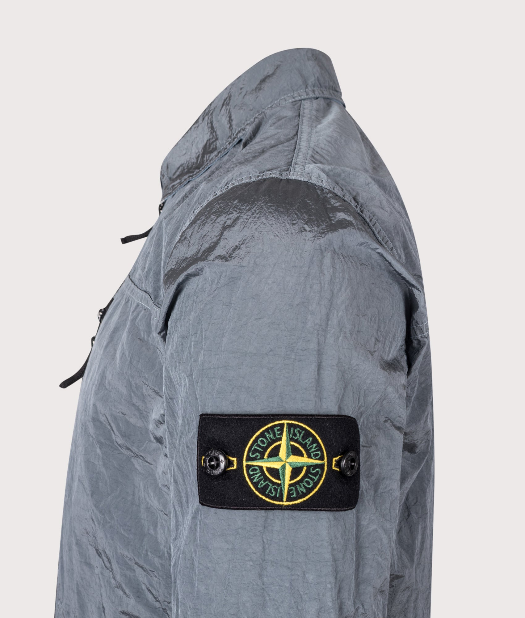 Stone Island Nylon Metal in Econyl® Overshirt in Ash Grey at EQVVS Menswear. Detail shot.