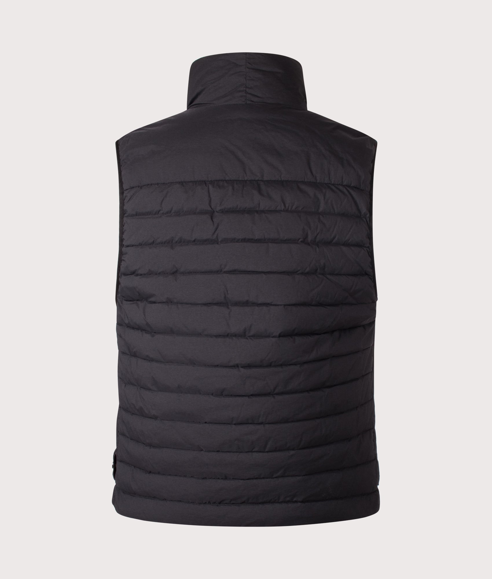 Stone Island Seamless Tunnel Nylon Down-TC Vest in Black at EQVVS Menswear. Back shot.