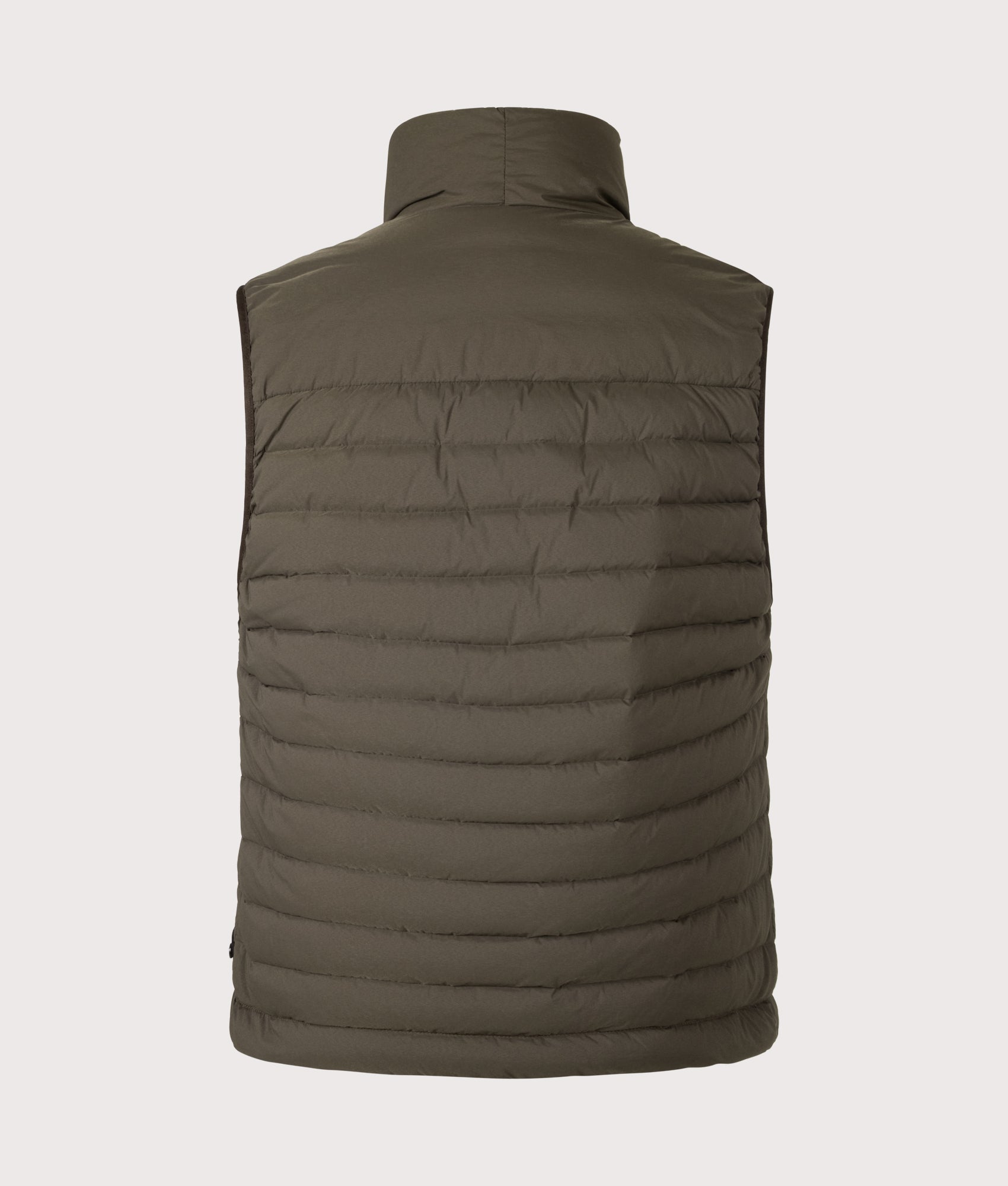 Stone Island Seamless Tunnel Nylon Down-TC Vest in Coal Grey at EQVVS Menswear. Back shot.
