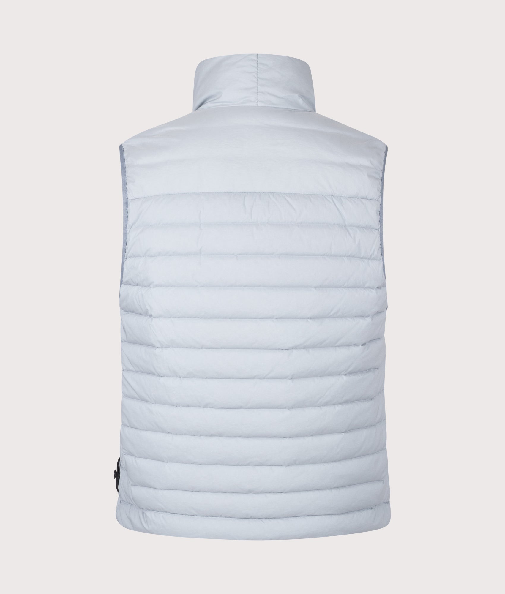 Stone Island Seamless Tunnel Nylon Down-TC Vest in Ash Grey at EQVVS Menswear. Back shot.