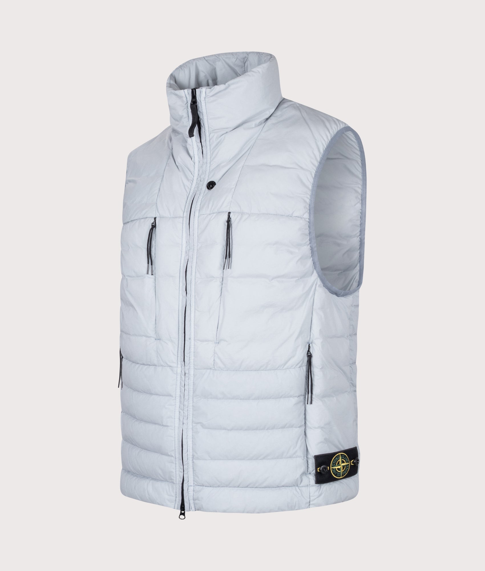 Stone Island Seamless Tunnel Nylon Down-TC Vest in Ash Grey at EQVVS Menswear. Angled front shot.