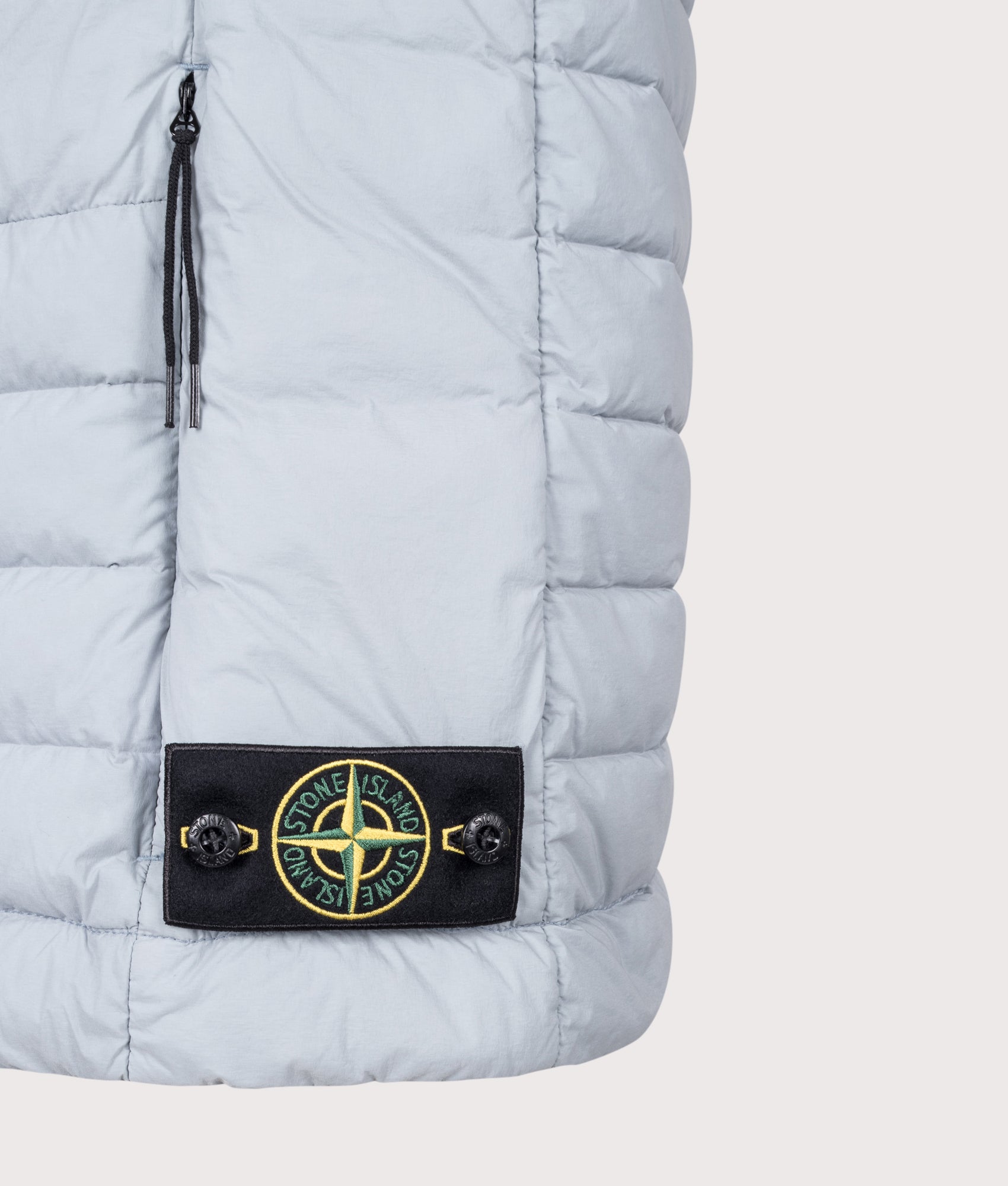 Stone Island Seamless Tunnel Nylon Down-TC Vest in Ash Grey at EQVVS Menswear. Detail shot.