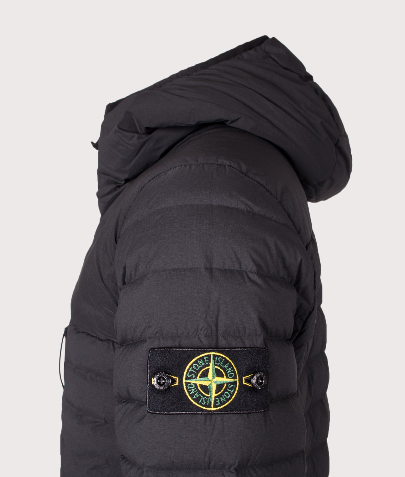 Stone Island Seamless Tunnel Nylon Down-TC Jacket in Black at EQVVS Menswear. Detail shot.