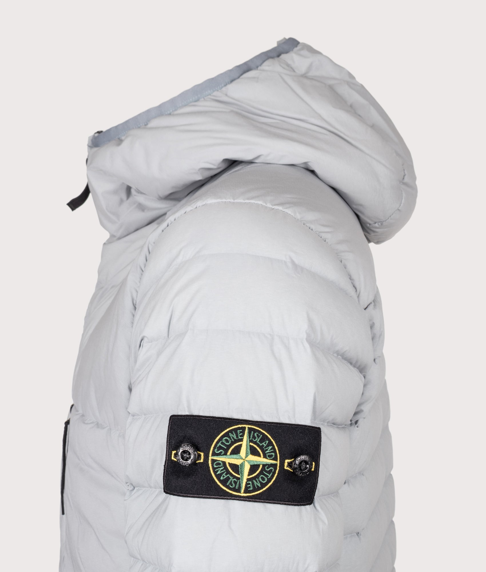 Stone Island Seamless Tunnel Nylon Down-TC Jacket in Ash Grey at EQVVS Menswear. Detail shot.