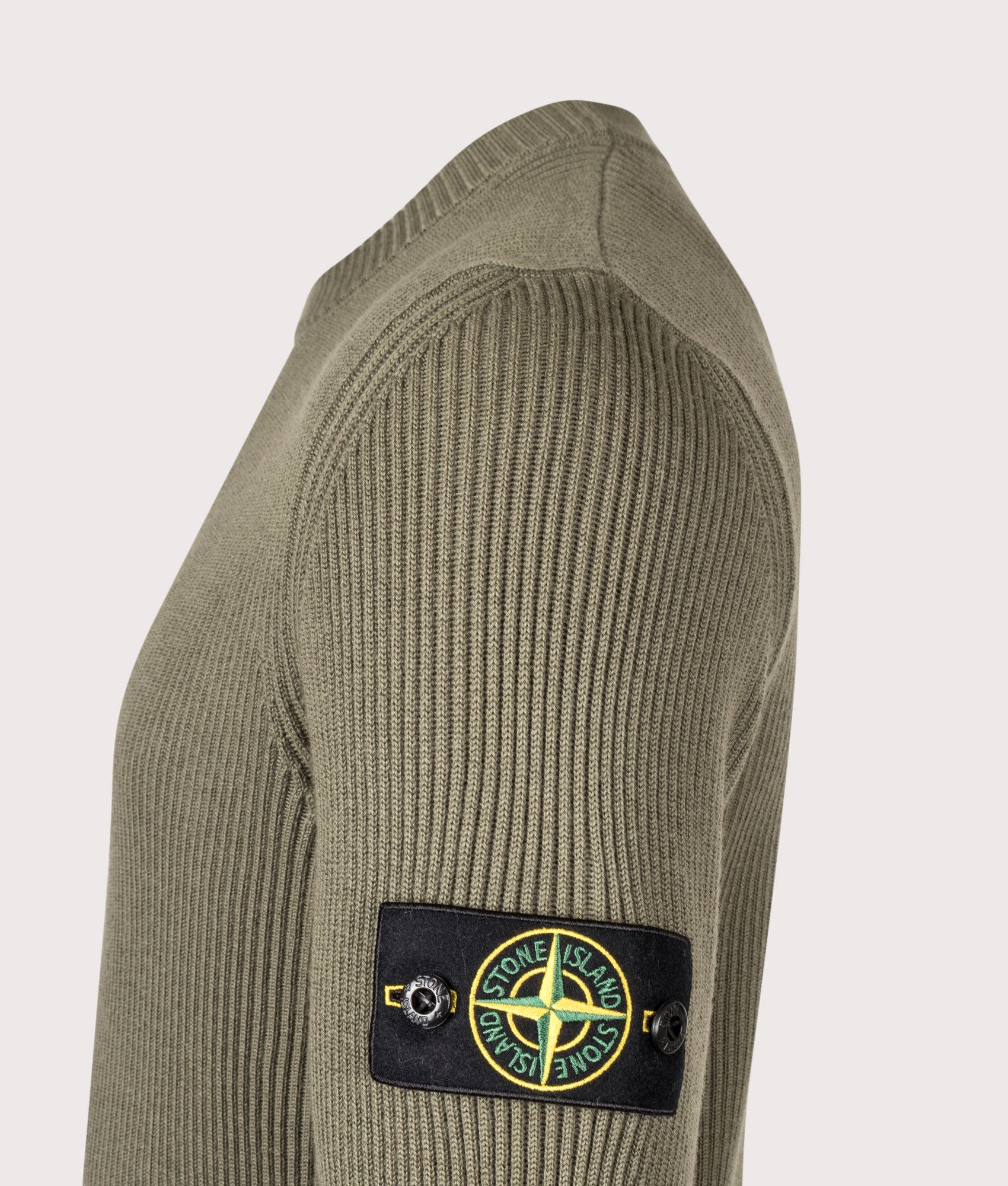 Stone Island Full Rib RWS Wool JumpeR in Military Green at EQVVS Menswear. Detail shot.