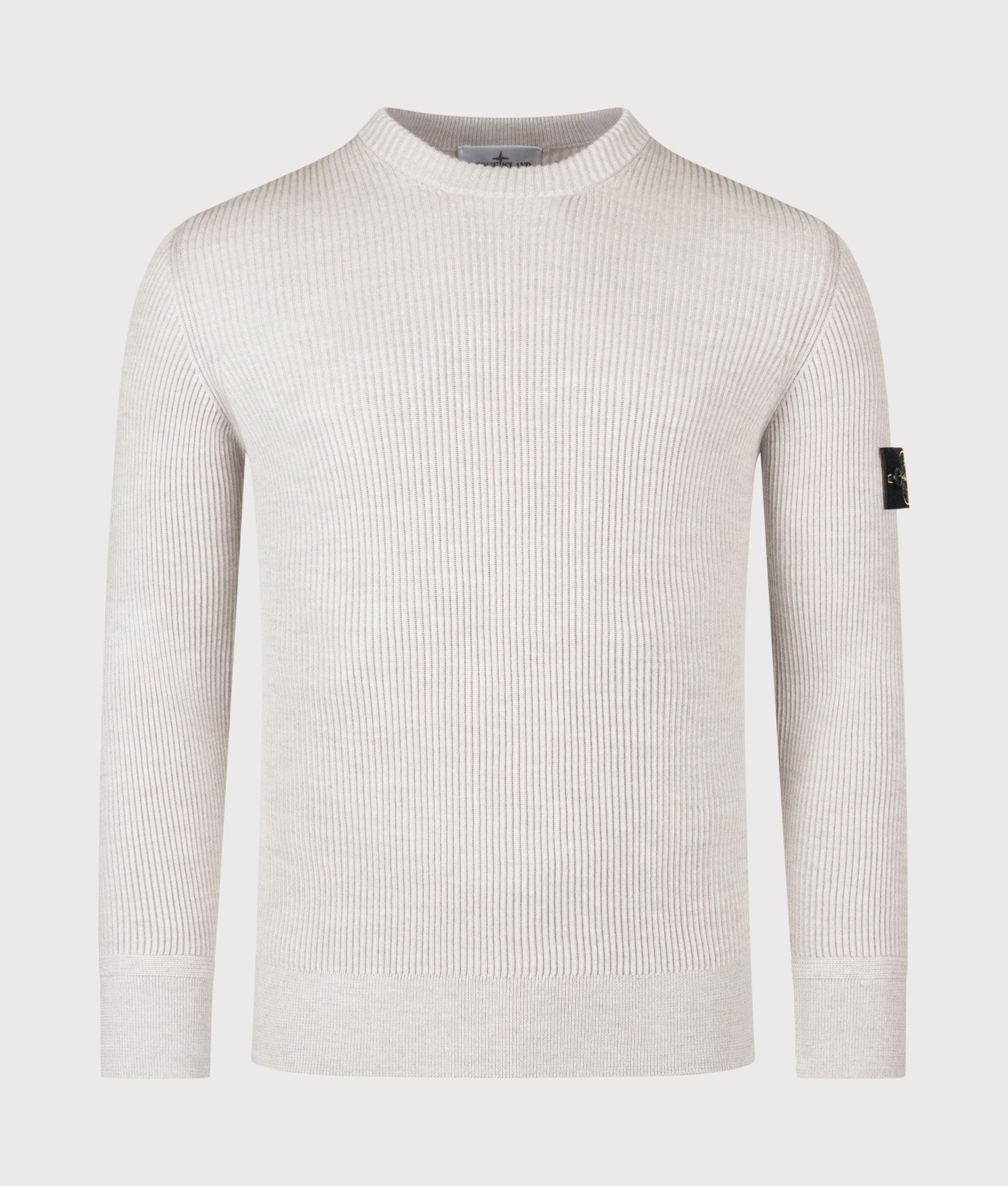 Stone Island Full Rib RWS Wool Jumper in Medium Beige at EQVVS Menswear. Front shot.