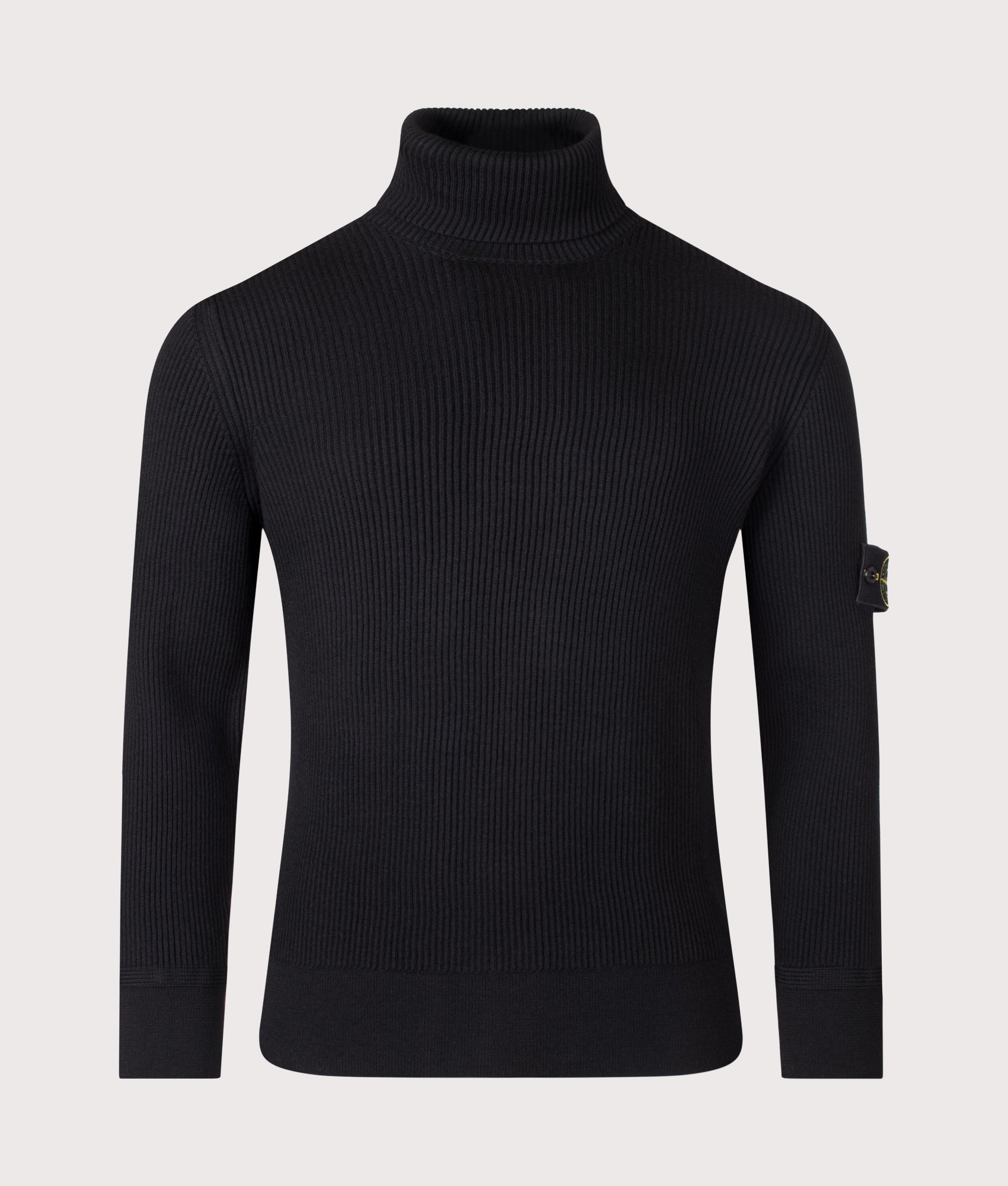 Stone Island Full Rib RWS Wool Turtle Neck Jumper in Black at EQVVS Menswear. Front shot.