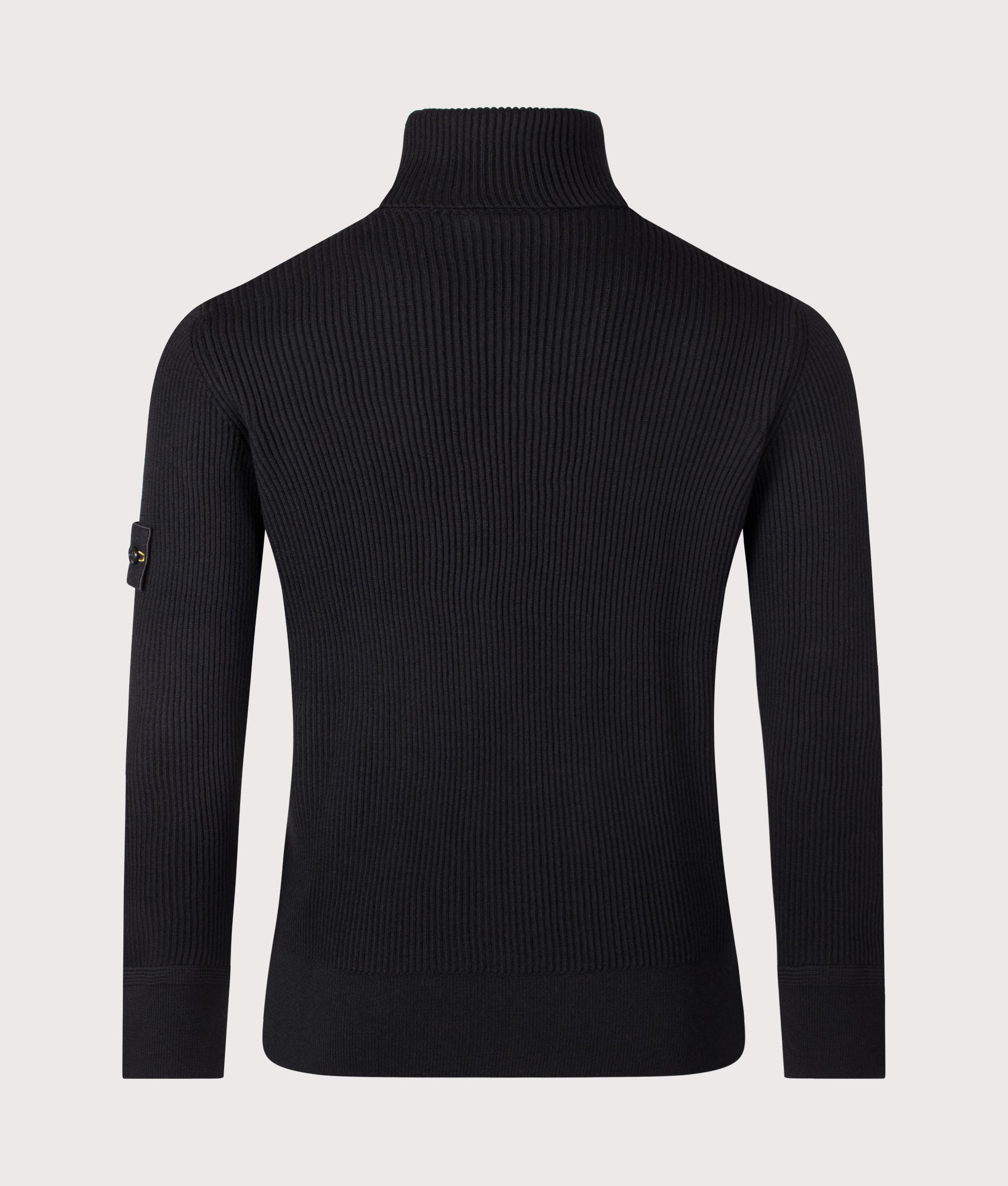 Stone Island Full Rib RWS Wool Turtle Neck Jumper in Black at EQVVS Menswear. Back shot.