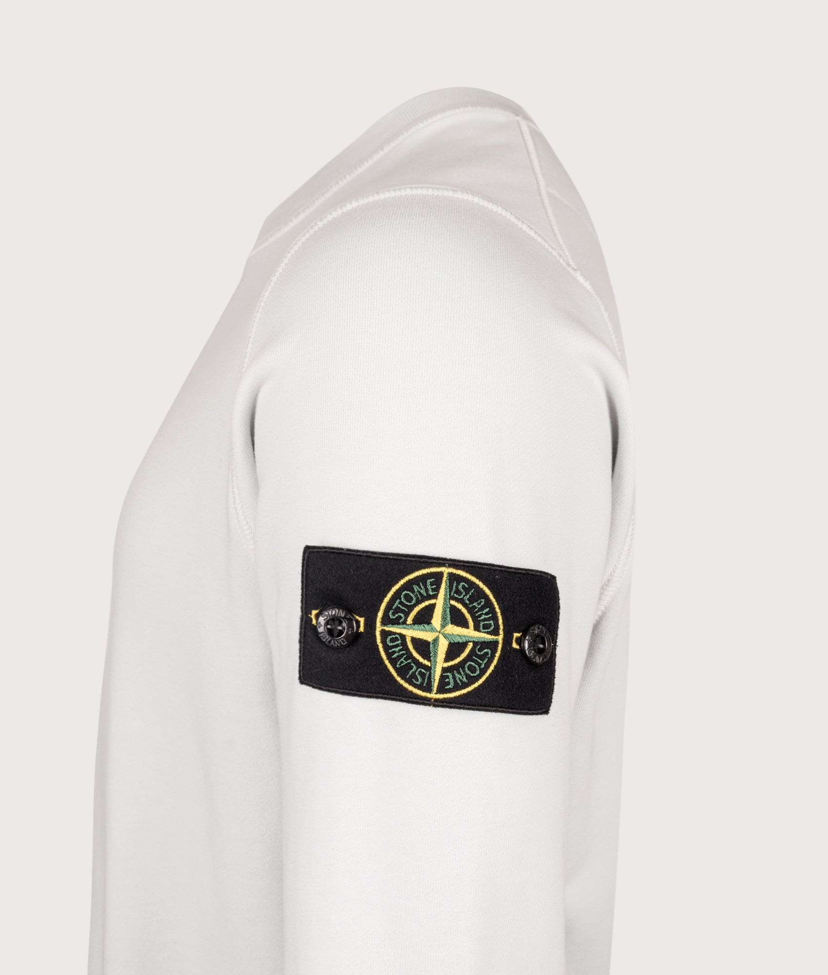 Stone Island Organic Cotton Crewneck Sweatshirt in Sky Blue at EQVVS Menswear. Detail shot.