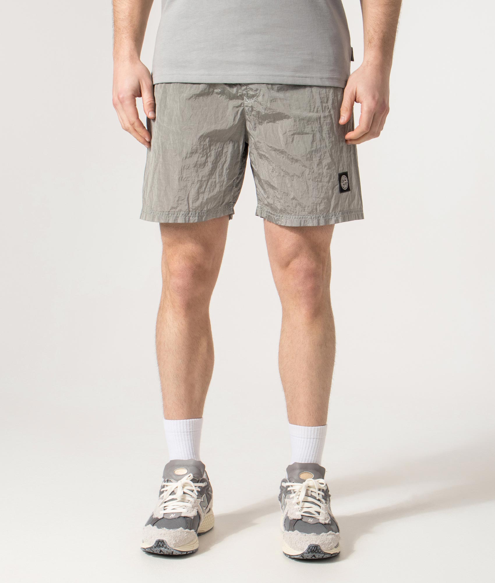 Regular Fit Compass Swim Shorts in Pearl Grey | Stone Island | EQVVS | Front model shot 