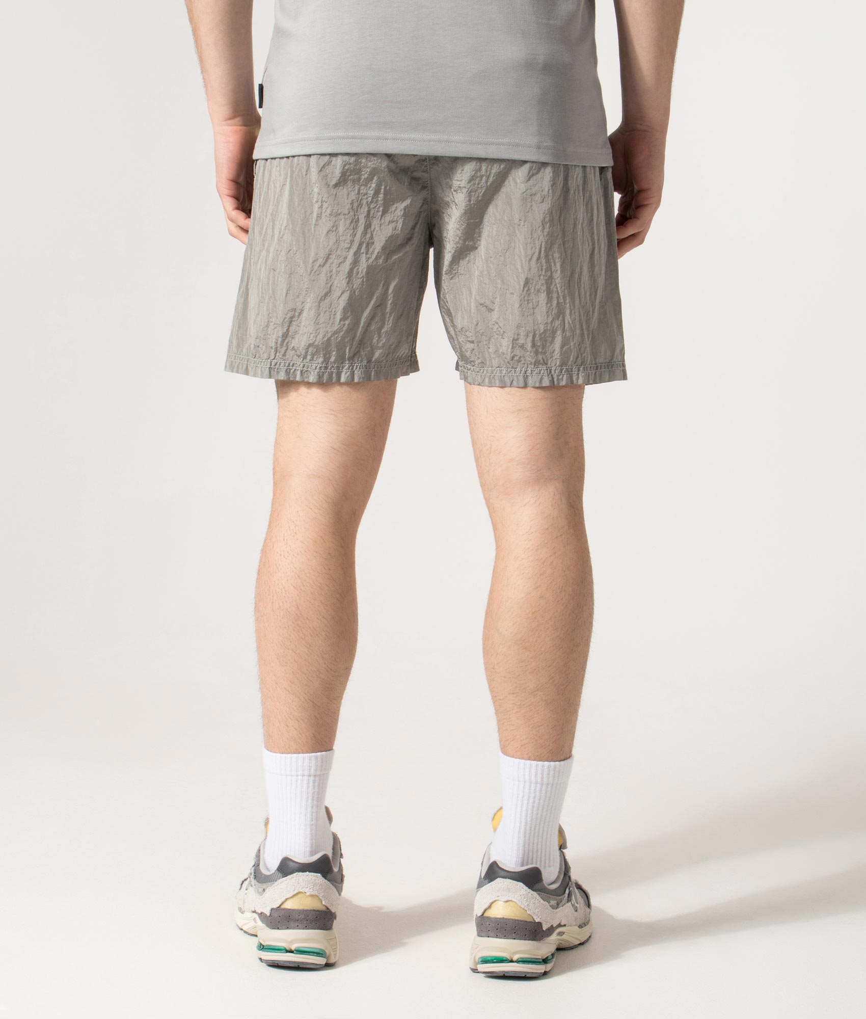 Regular Fit Compass Swim Shorts in Pearl Grey | Stone Island | EQVVS | Back model shot 