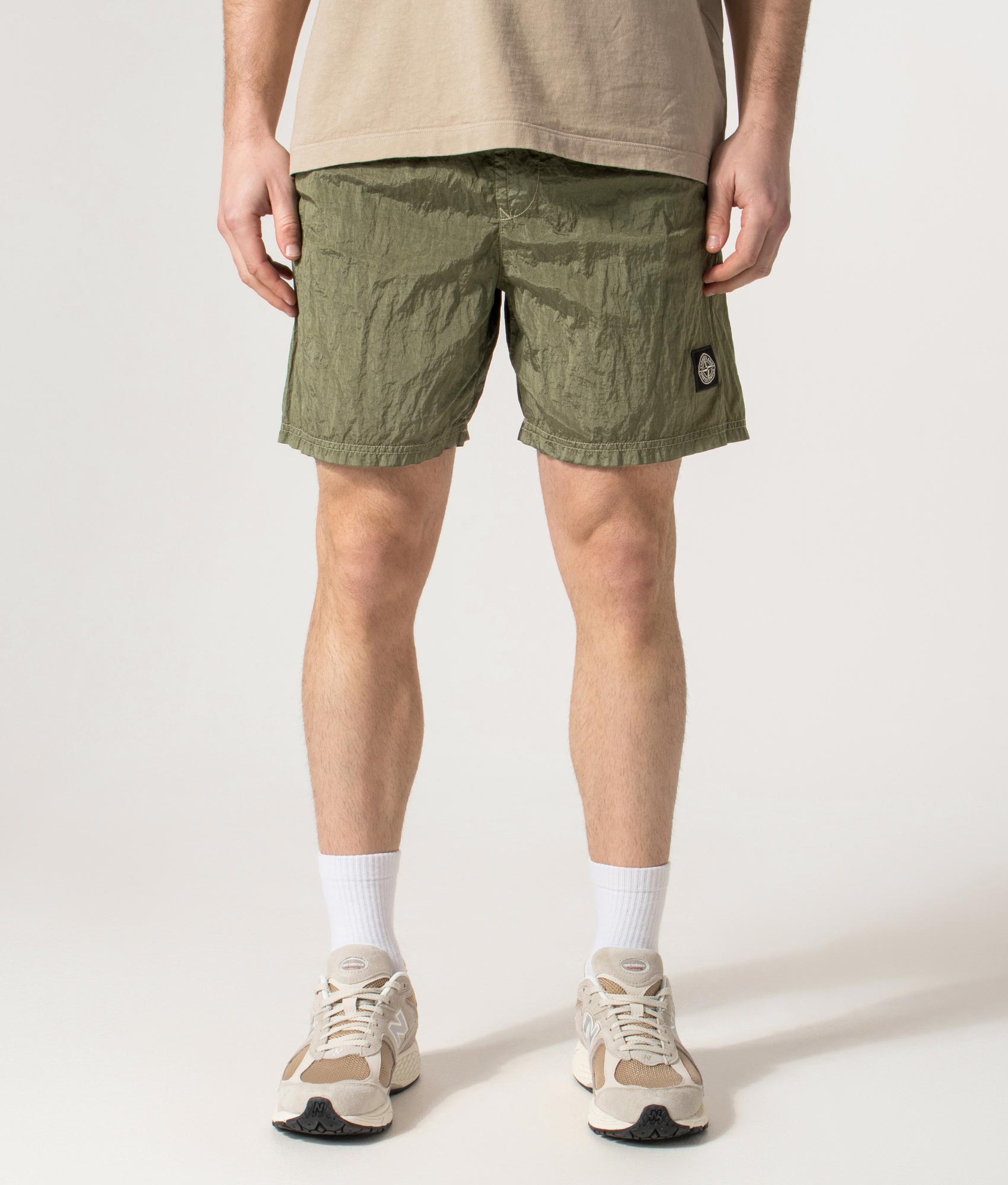 Regular Fit Compass Swim Shorts in Military Green | Stone Island | EQVVS | Front model shot 