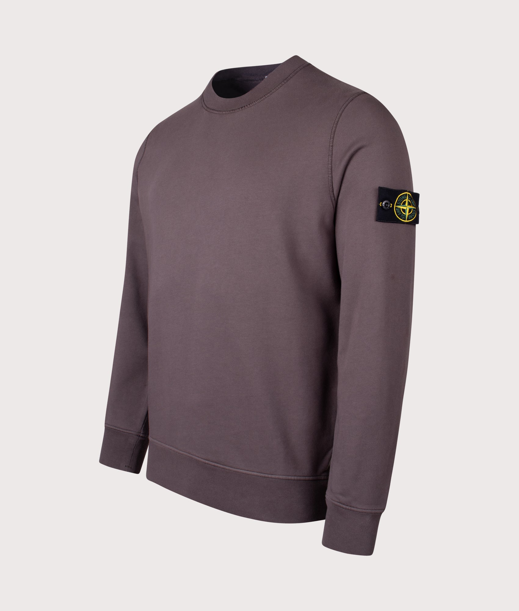 Stone Island Organic Cotton Sweatshirt in Charcoal at EQVVS Menswear. Angled front shot.