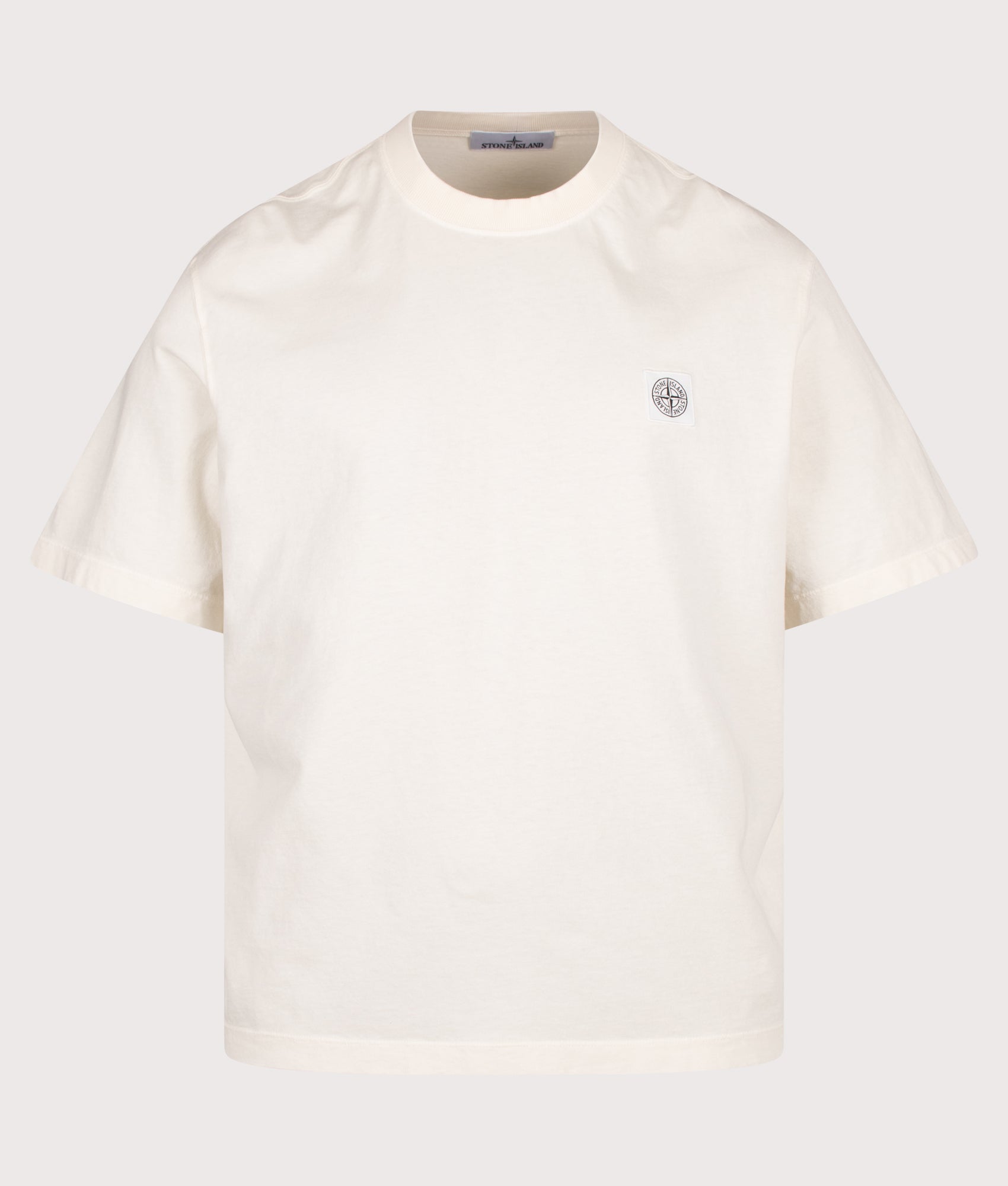 Stone Island Combed Organic Cotton Jersey T-Shirt in Ivory at EQVVS Menswear. Front shot.