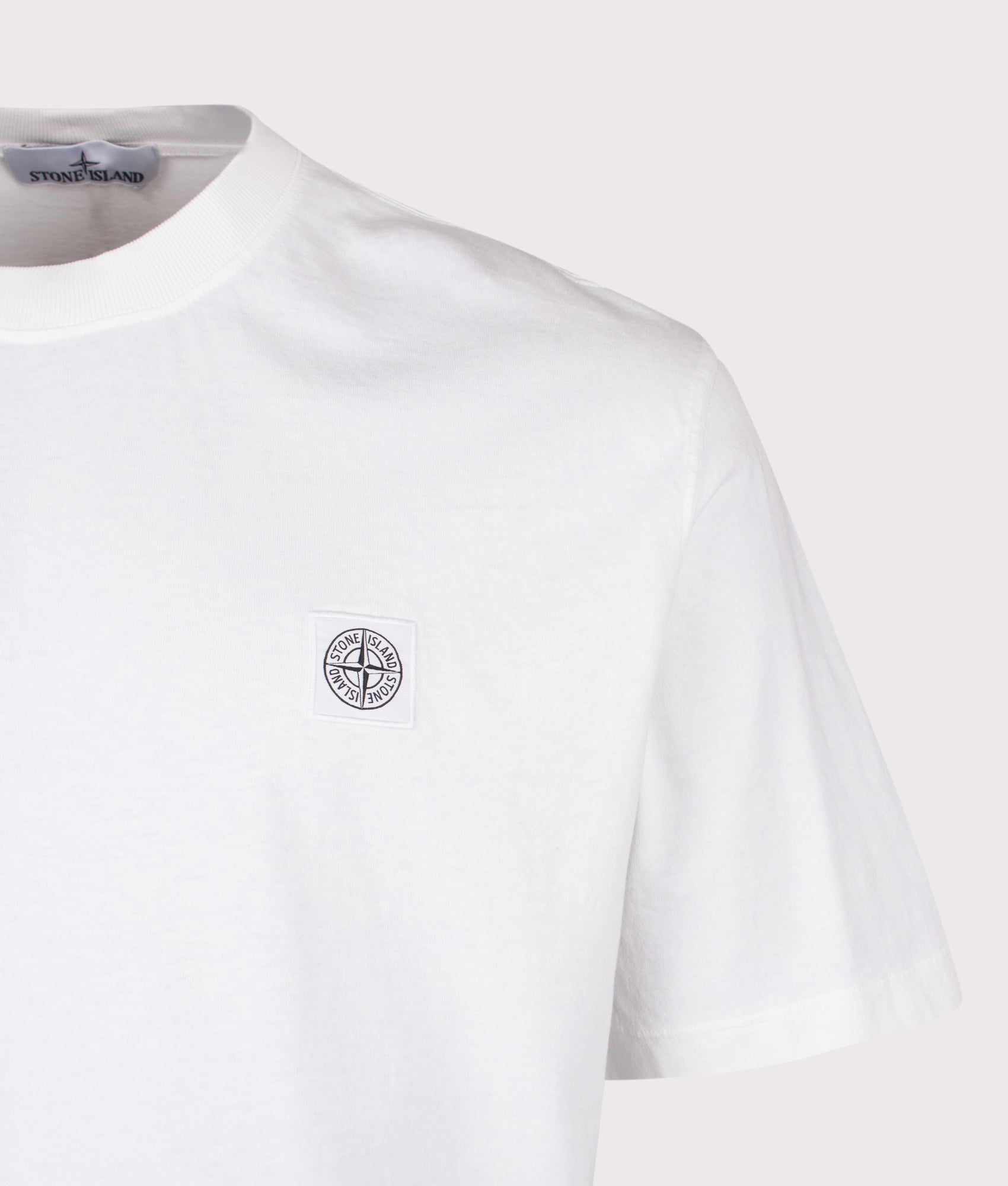 Stone Island Combed Organic Cotton Jersey T-Shirt in White at EQVVS Menswear. Detail shot.