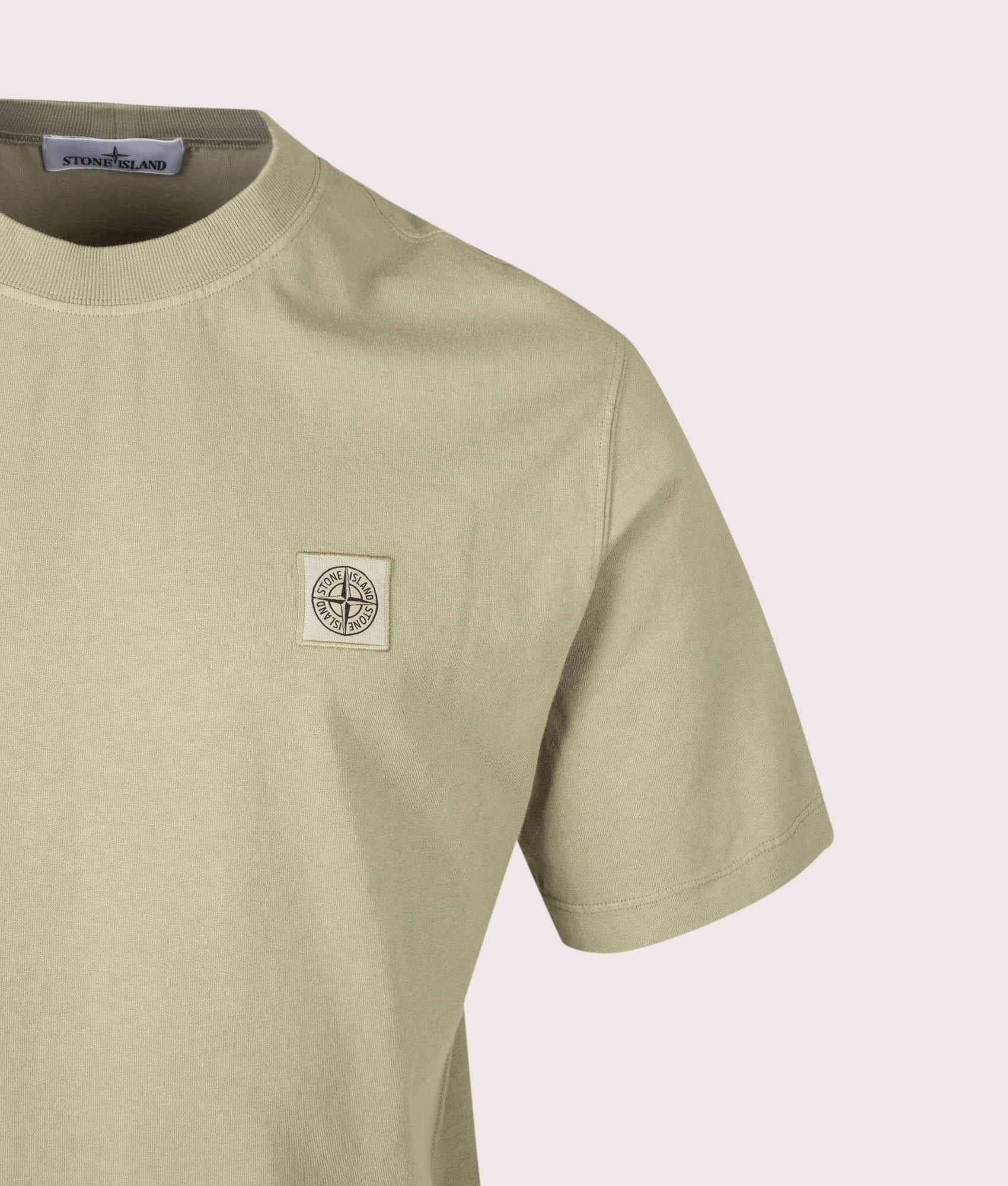 Stone Island Combed Organic Cotton Jersey T-Shirt in Laurel Green at EQVVS Menswear. Detail shot.