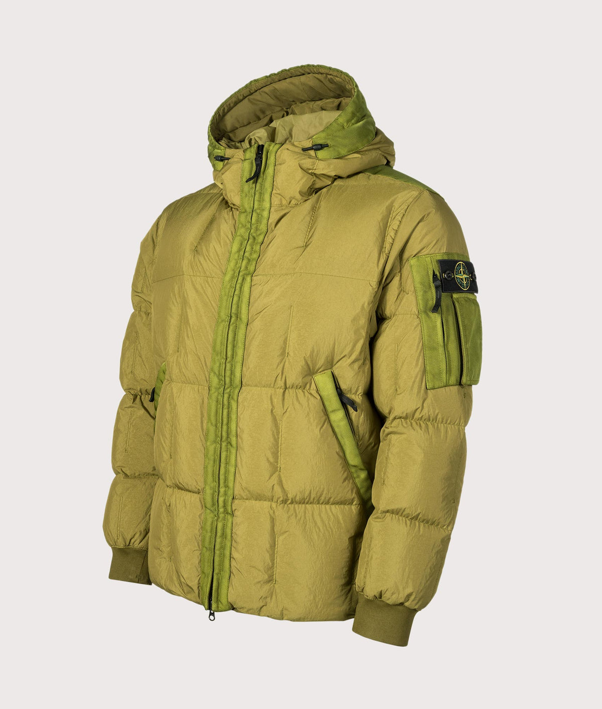 Stone Island Garment Dyed Crinkle Reps NY Down Jacket in Cactus at EQVVS Menswear. Angled front shot.