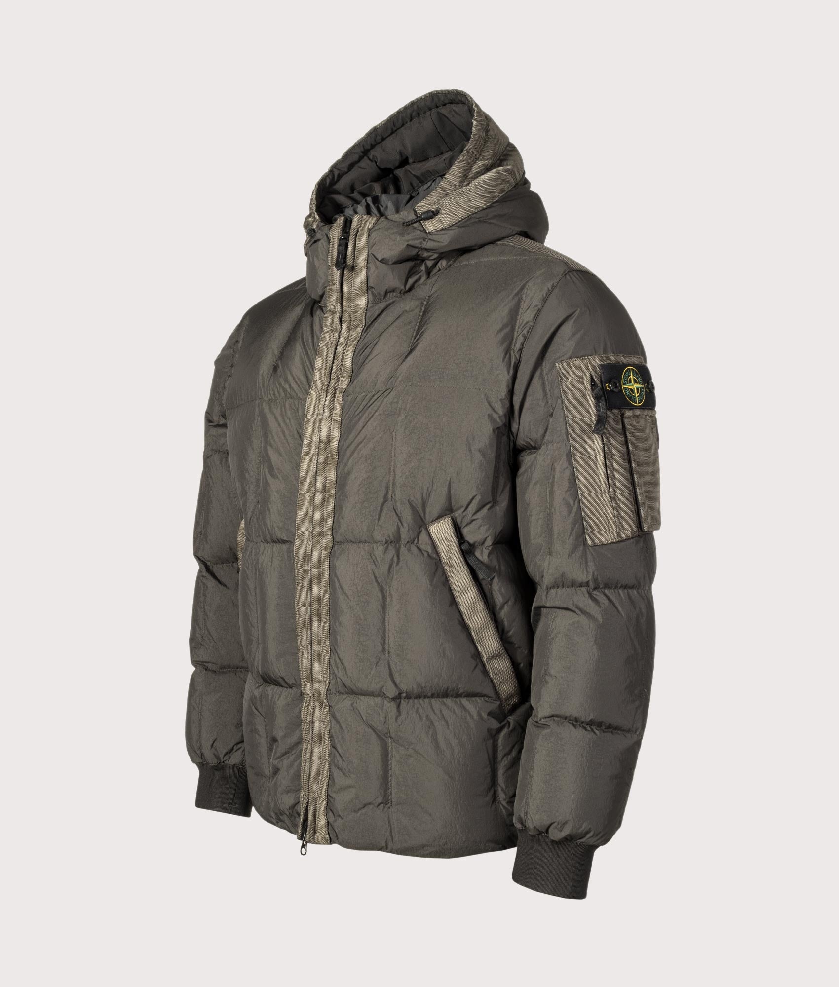 Stone Island Garment Dyed Crinkle Reps NY Down Jacket in Lead Grey at EQVVS Menswear. Angled front shot. 