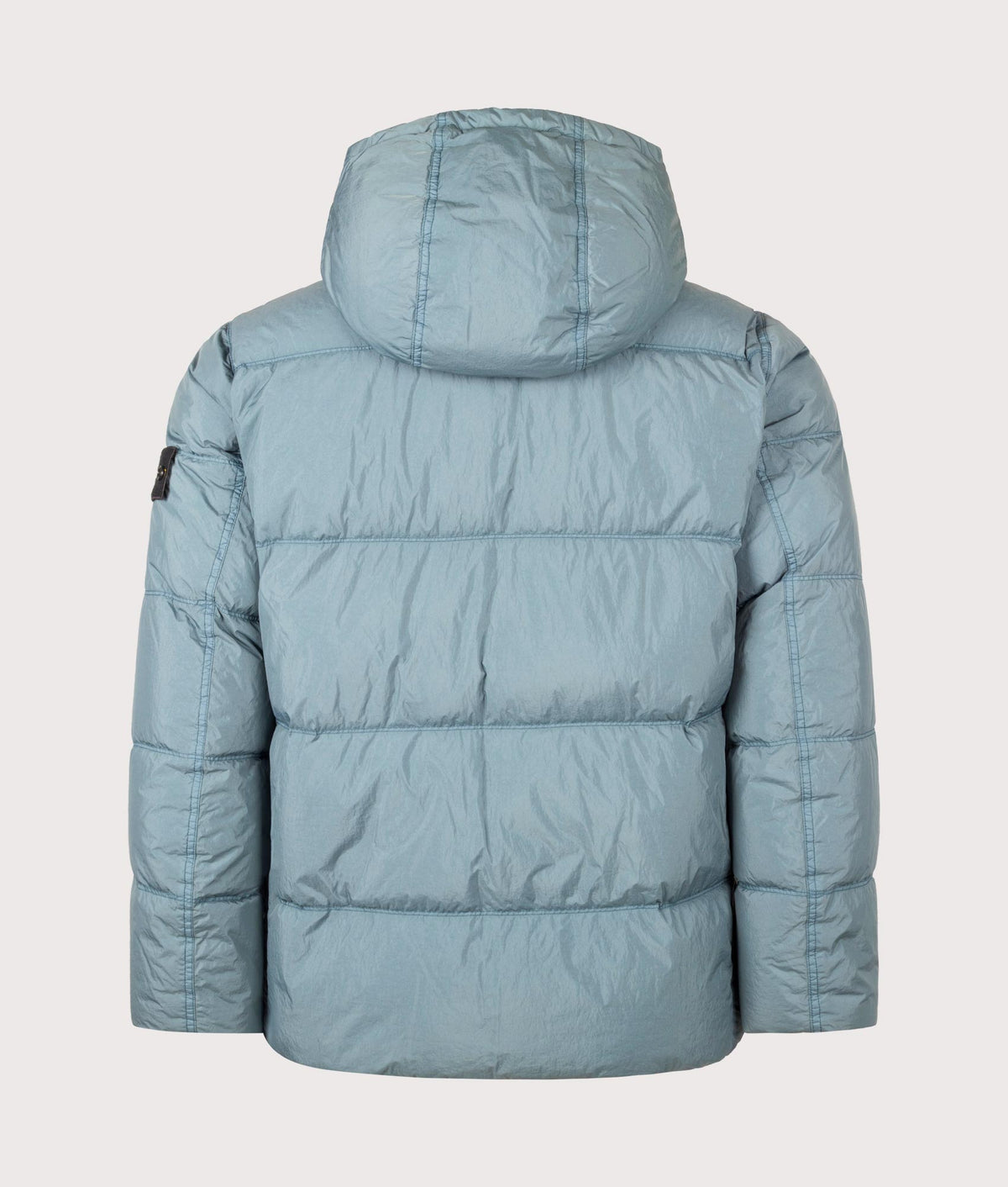 Stone Island Crinkle Reps NY Puffer Jacket in Steel Blue at EQVVS Menswear. Back shot.