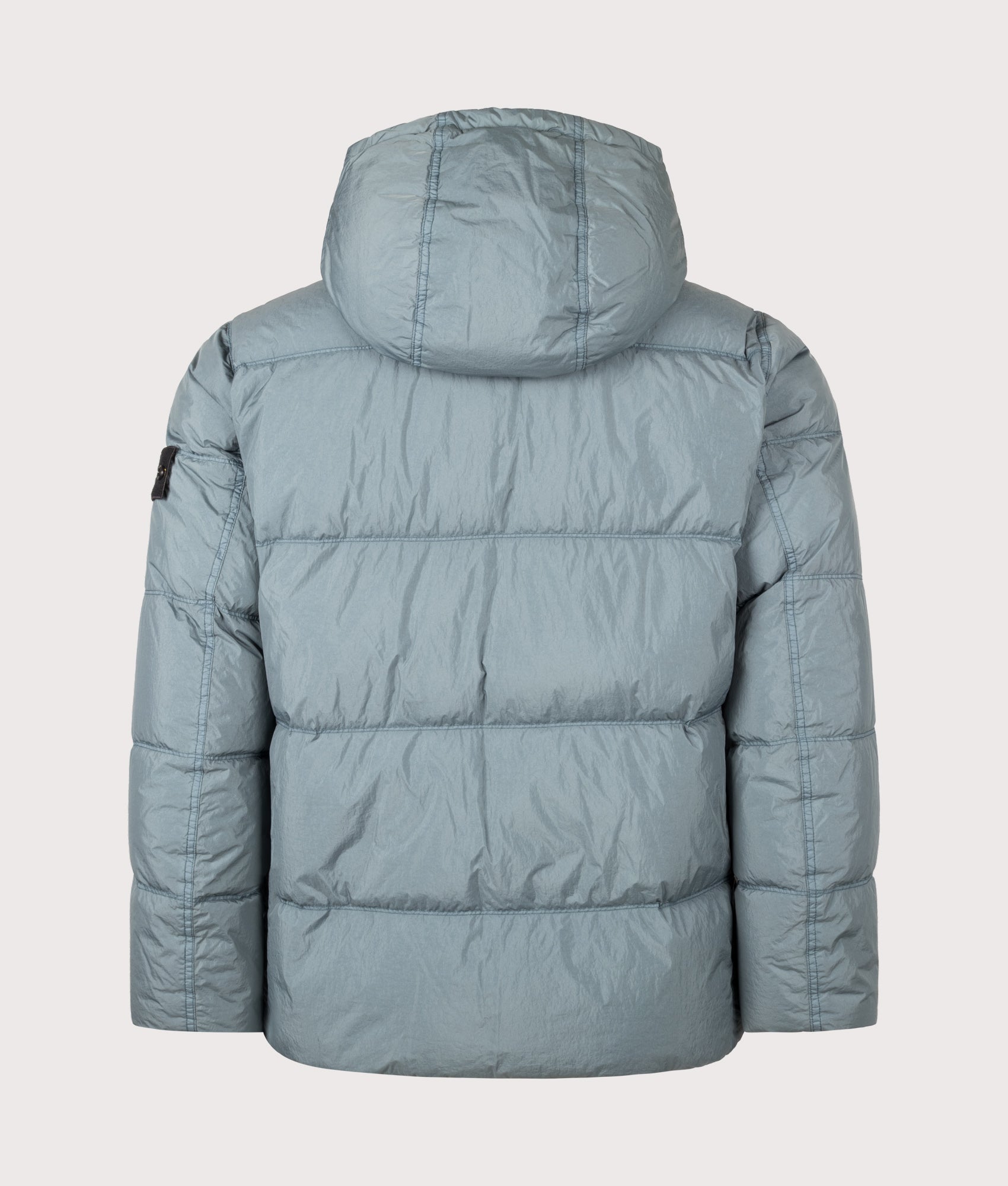 Stone Island Crinkle Reps NY Puffer Jacket in Steel Blue at EQVVS Menswear. Back shot.