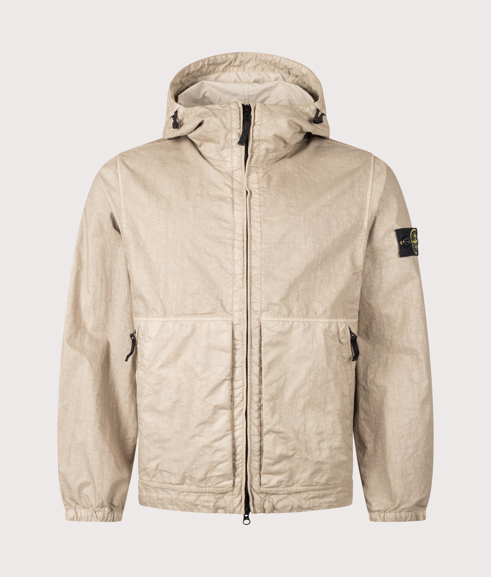 Stone Island Organic-Look Nylon Panama-TC Jacket in Desert sand at EQVVS Menswear. Front shot.