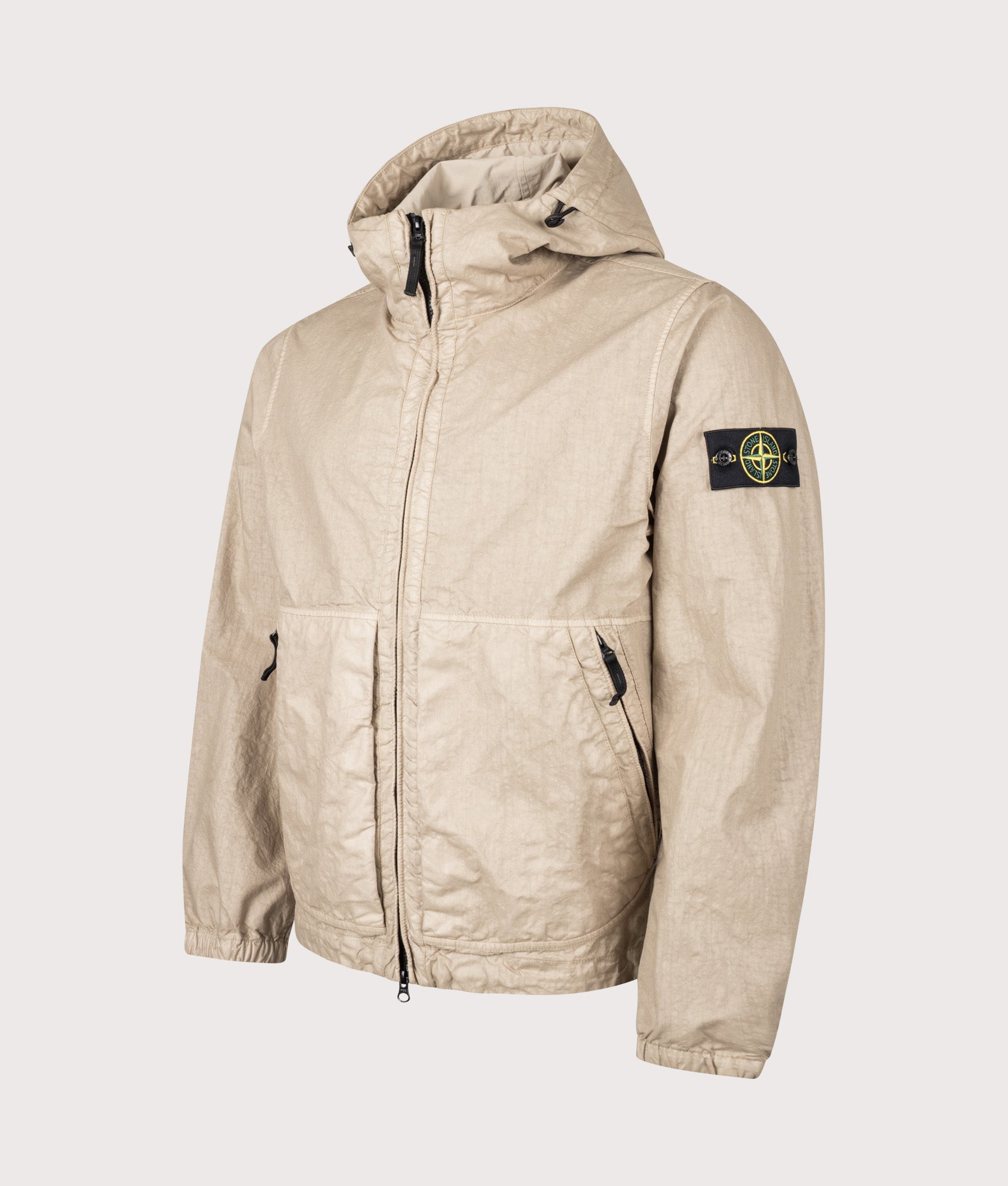 Stone Island Organic-Look Nylon Panama-TC Jacket in Desert sand at EQVVS Menswear. Angled front shot.