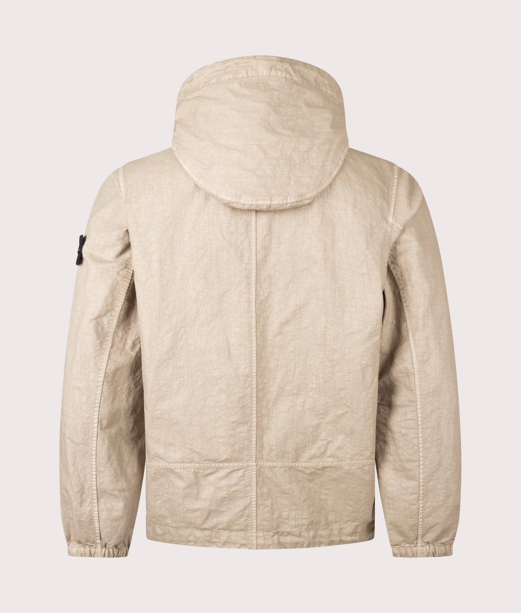 Stone Island Organic-Look Nylon Panama-TC Jacket in Desert sand at EQVVS Menswear. Back shot.