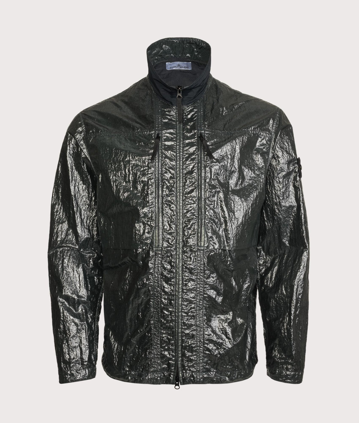 Stone Island Comfort Fit Nylon Lucido Overshirt in Dark Green at EQVVS Menswear. Front shot.