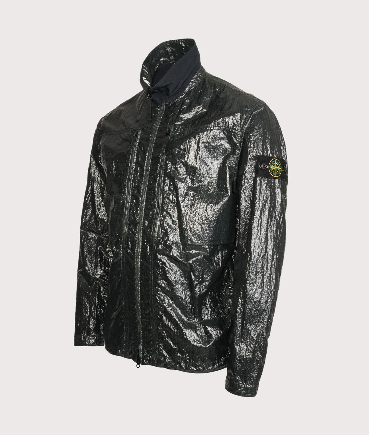 Stone Island Comfort Fit Nylon Lucido Overshirt in Dark Green at EQVVS Menswear. Angled front shot.
