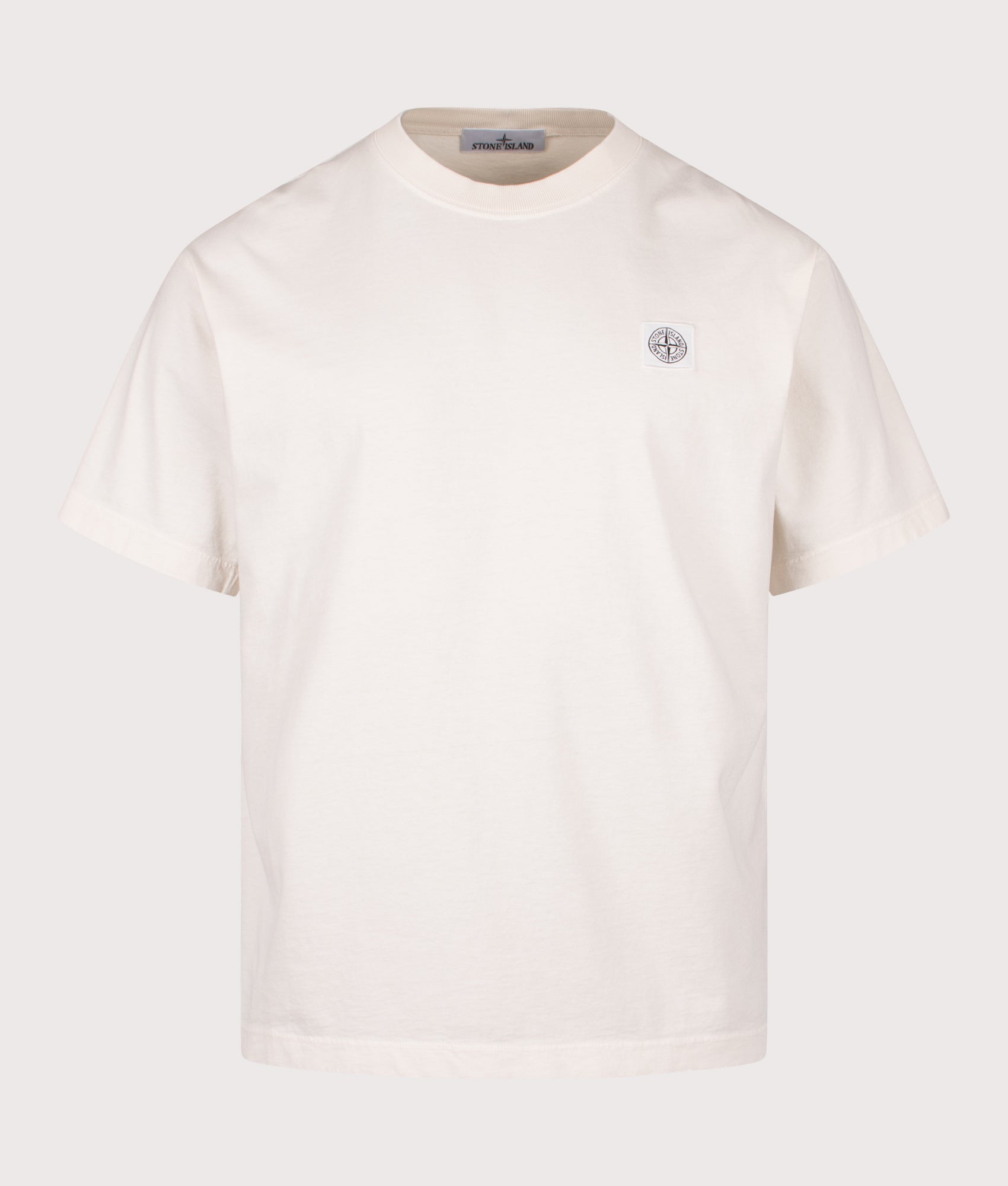 Stone Island Compass Patch T-Shirt in Ivory at EQVVS Menswear. Front shot.