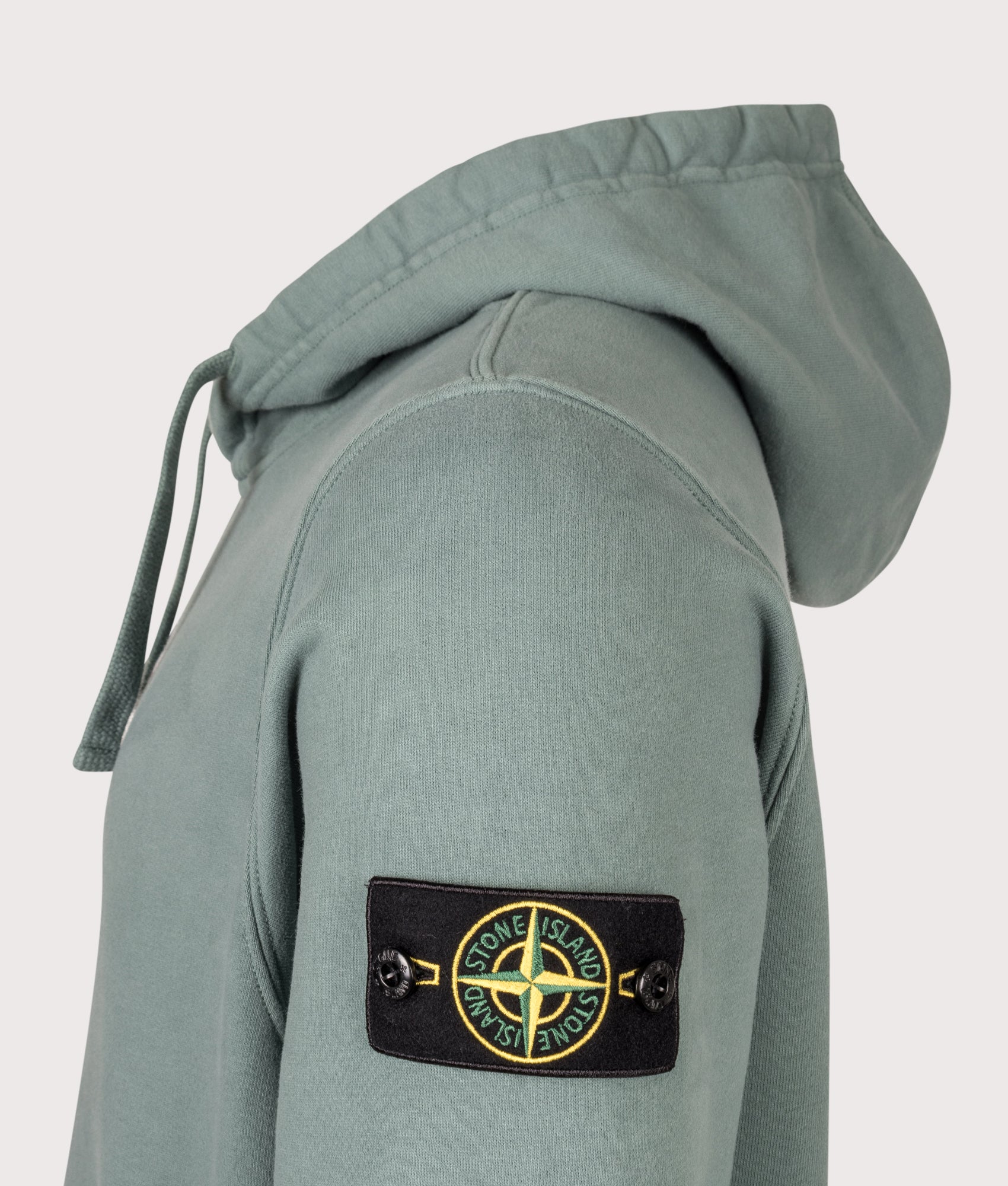 Stone Island Brushed Organic Cotton Fleece Hoodie in Ocean Green at EQVVS Menswear. Detail shot.
