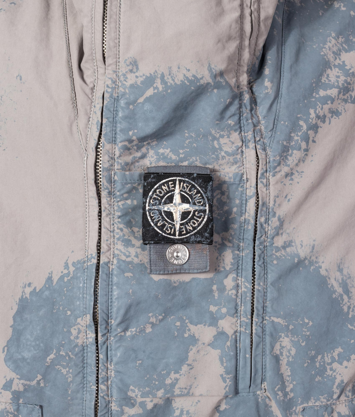 Stone Island Hand Painted David Light-TC Parka in Gray at EQVVS Menswear. Detail shot.