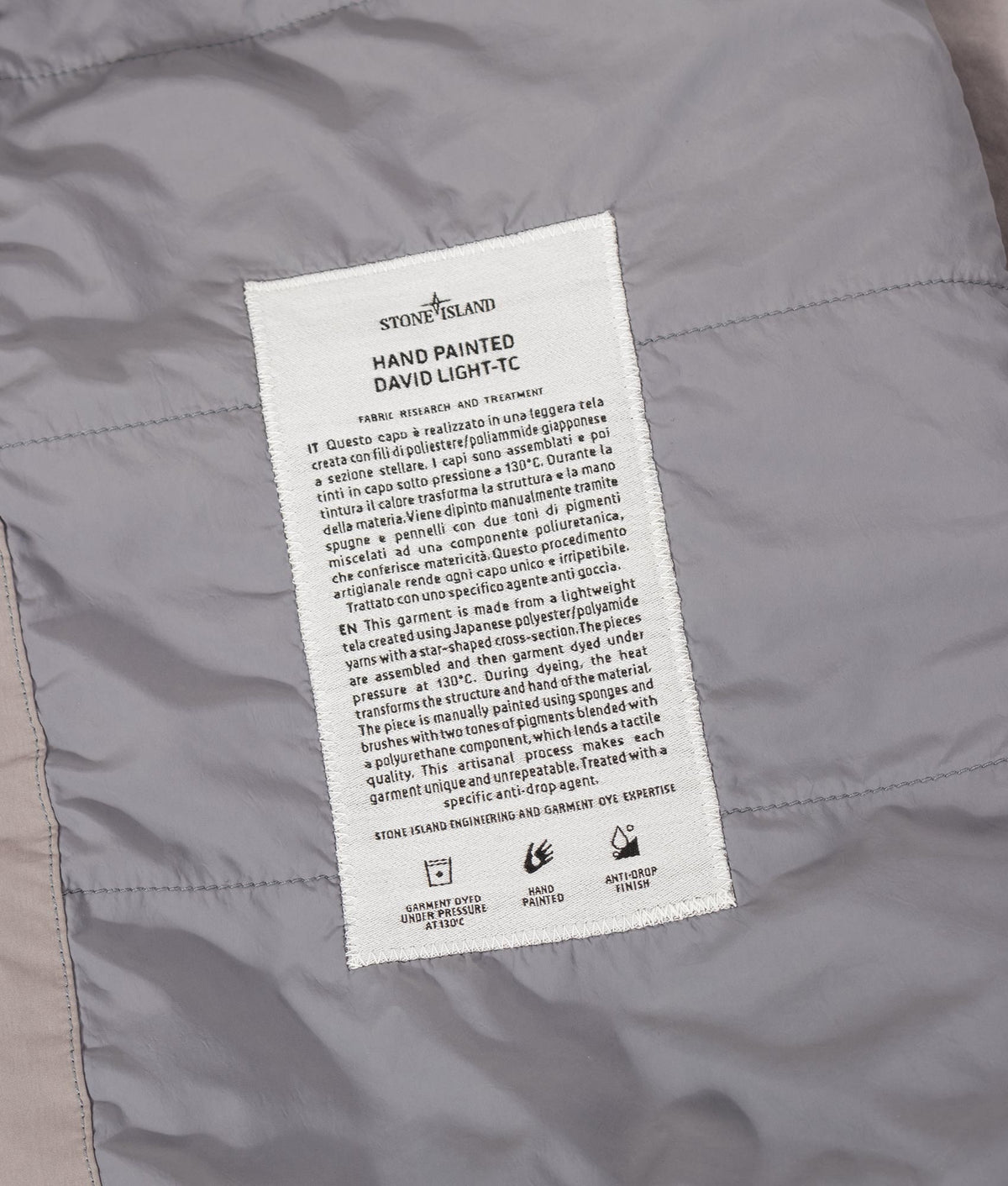 Stone Island Hand Painted David Light-TC Parka in Gray at EQVVS Menswear.  Label shot.