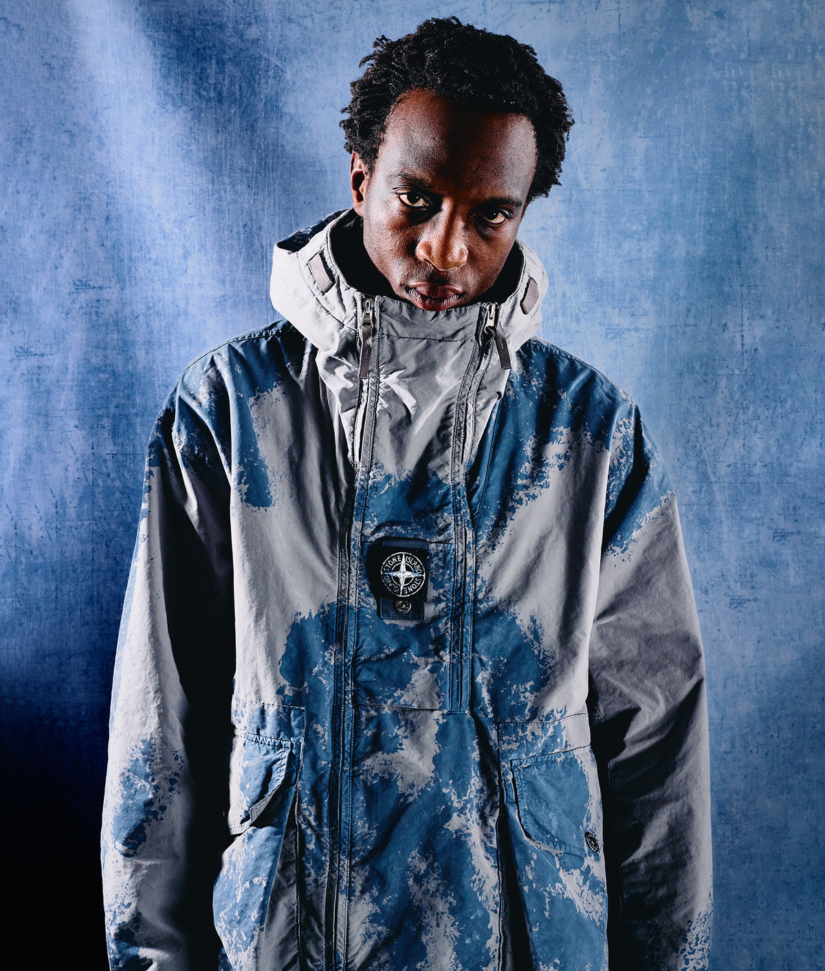 Stone Island Hand Painted David Light-TC Parka in Gray at EQVVS Menswear. Campaign shot.