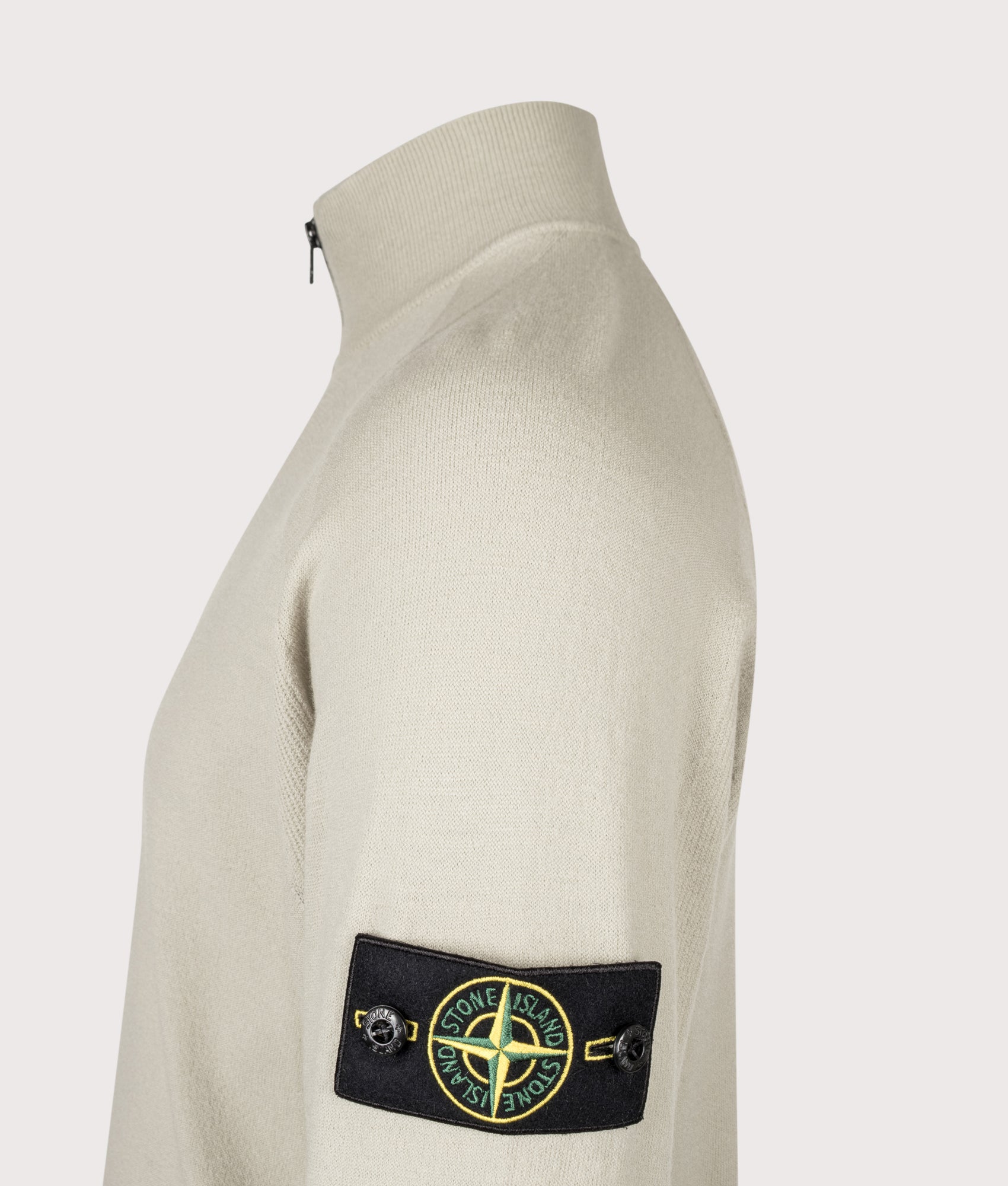 Stone Island Stretch RWS Wool Quarter Zip Jumper in Sand at EQVVS Menswear. Detail shot.
