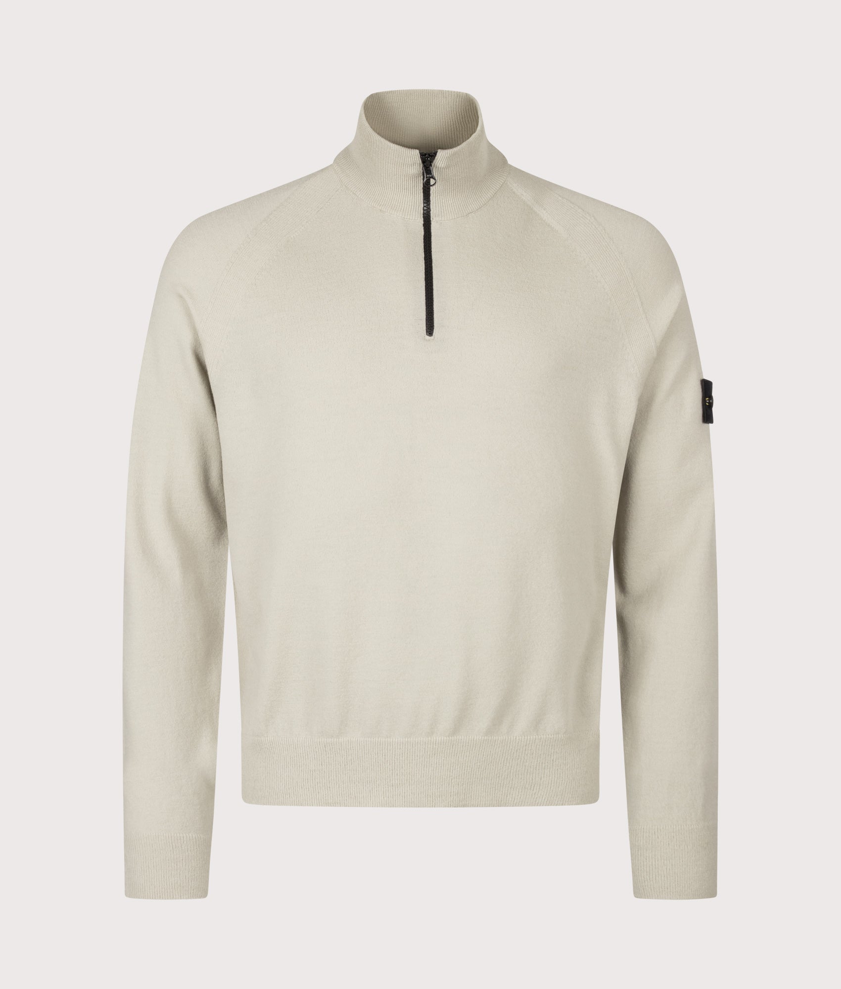 Stone Island Stretch RWS Wool Quarter Zip Jumper in Sand at EQVVS Menswear. Front shot.