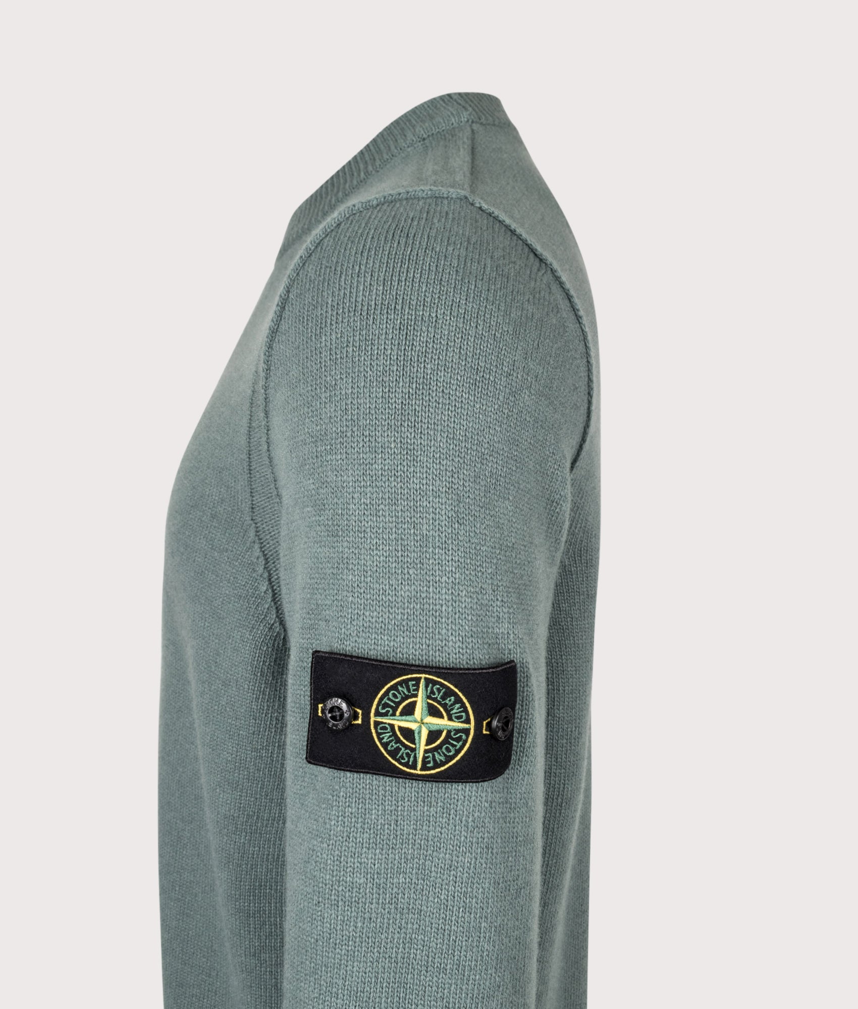 Stone Island Lambswool Crewneck Jumper in Ocean Green at EQVVS Menswear. Detail shot.