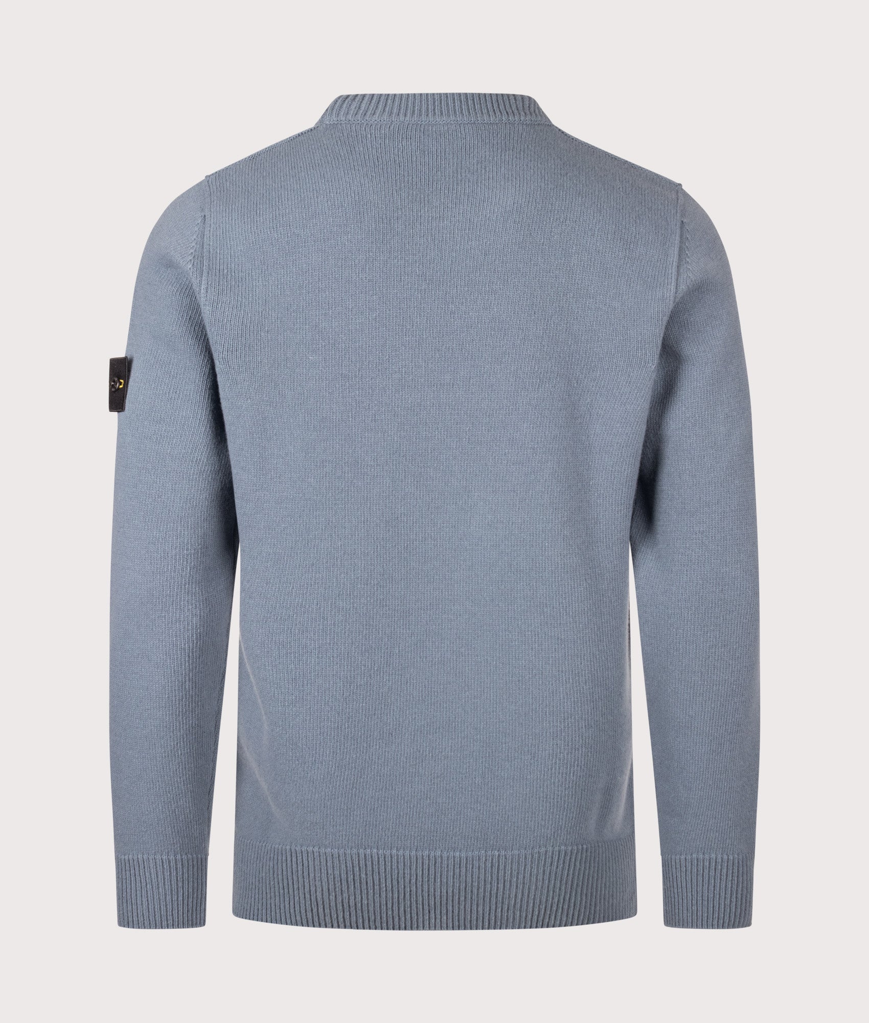 Stone Island Lambswool Crewneck Jumper in Steel Blue at EQVVS Menswear. Back shot.