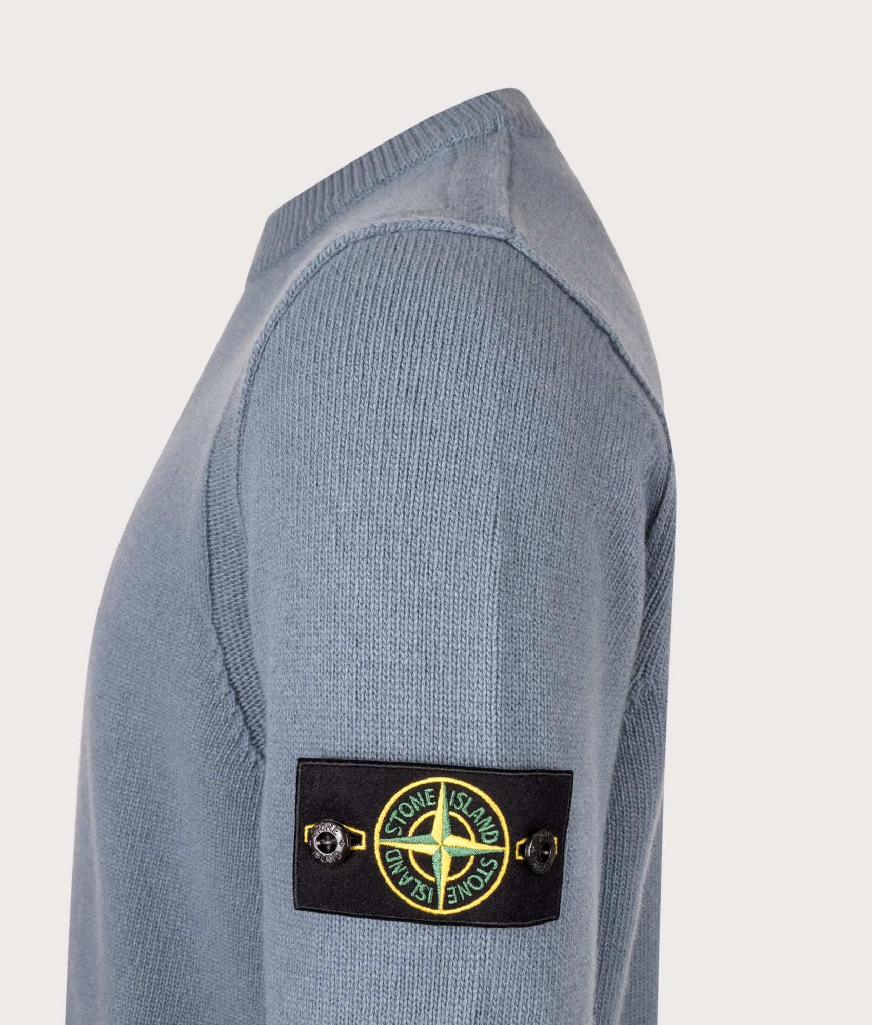Stone Island Lambswool Crewneck Jumper in Steel Blue at EQVVS Menswear. Detail shot.