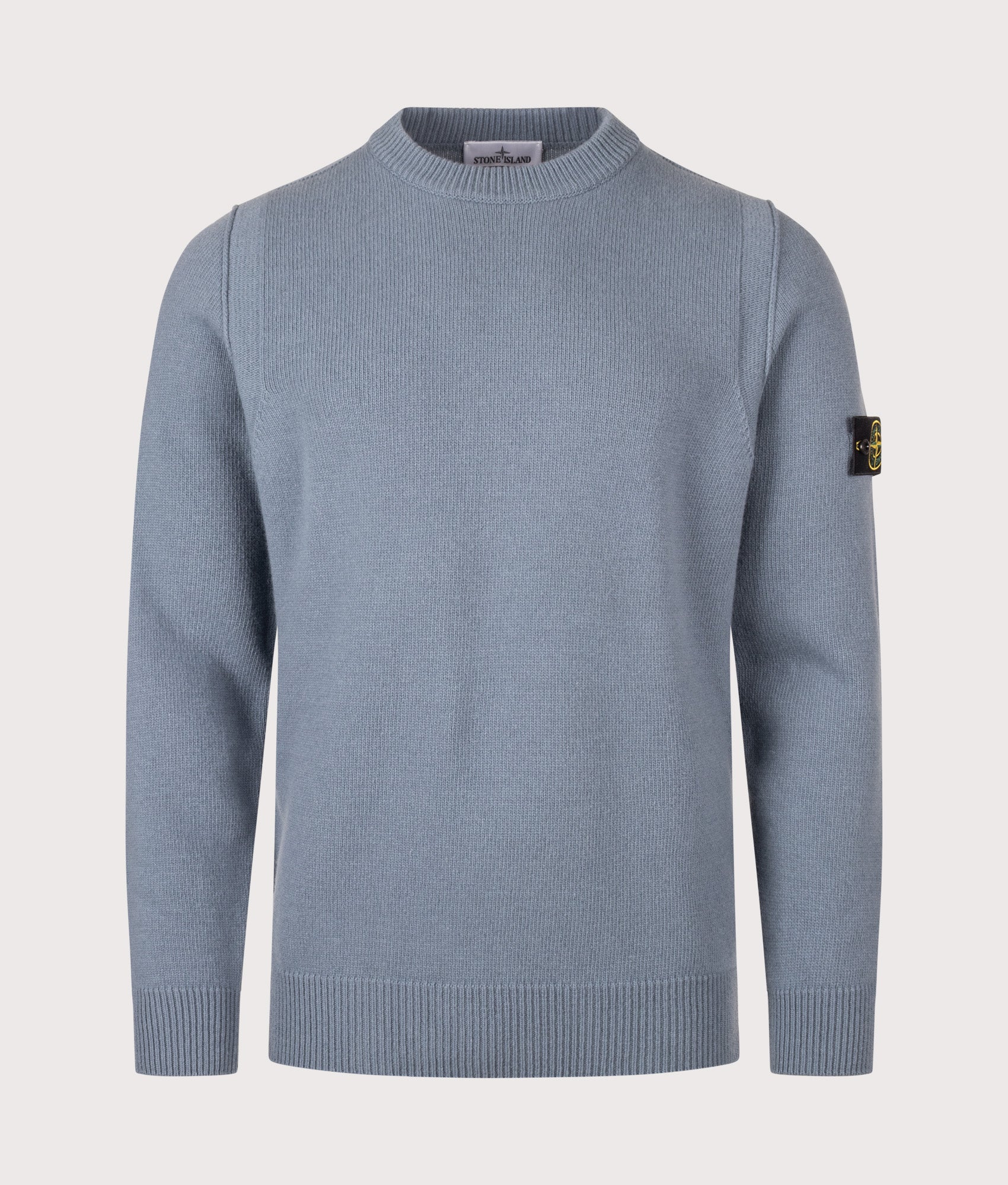 Stone Island Lambswool Crewneck Jumper in Steel Blue at EQVVS Menswear. Front shot.