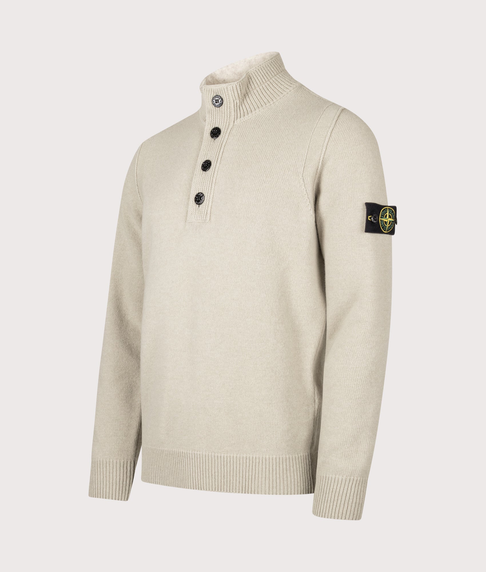 Stone Island Lambswool Button Up Jumper in Sand at EQVVS Menswear. Angled front shot.
