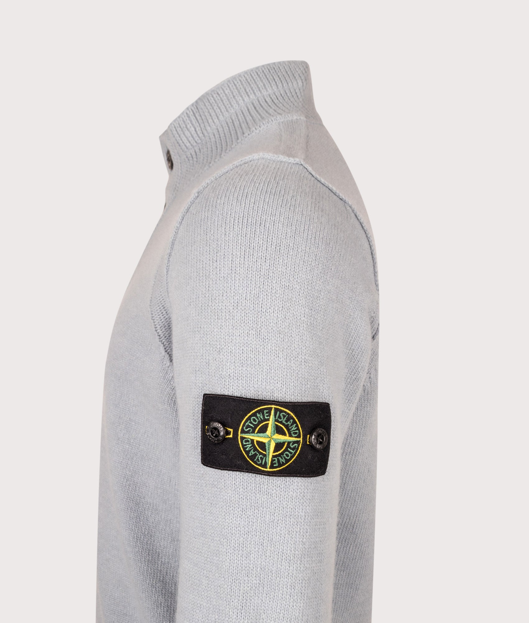 Stone Island Lambswool Button Up Jumper in Ash Grey at EQVVS Menswear. Detail shot.