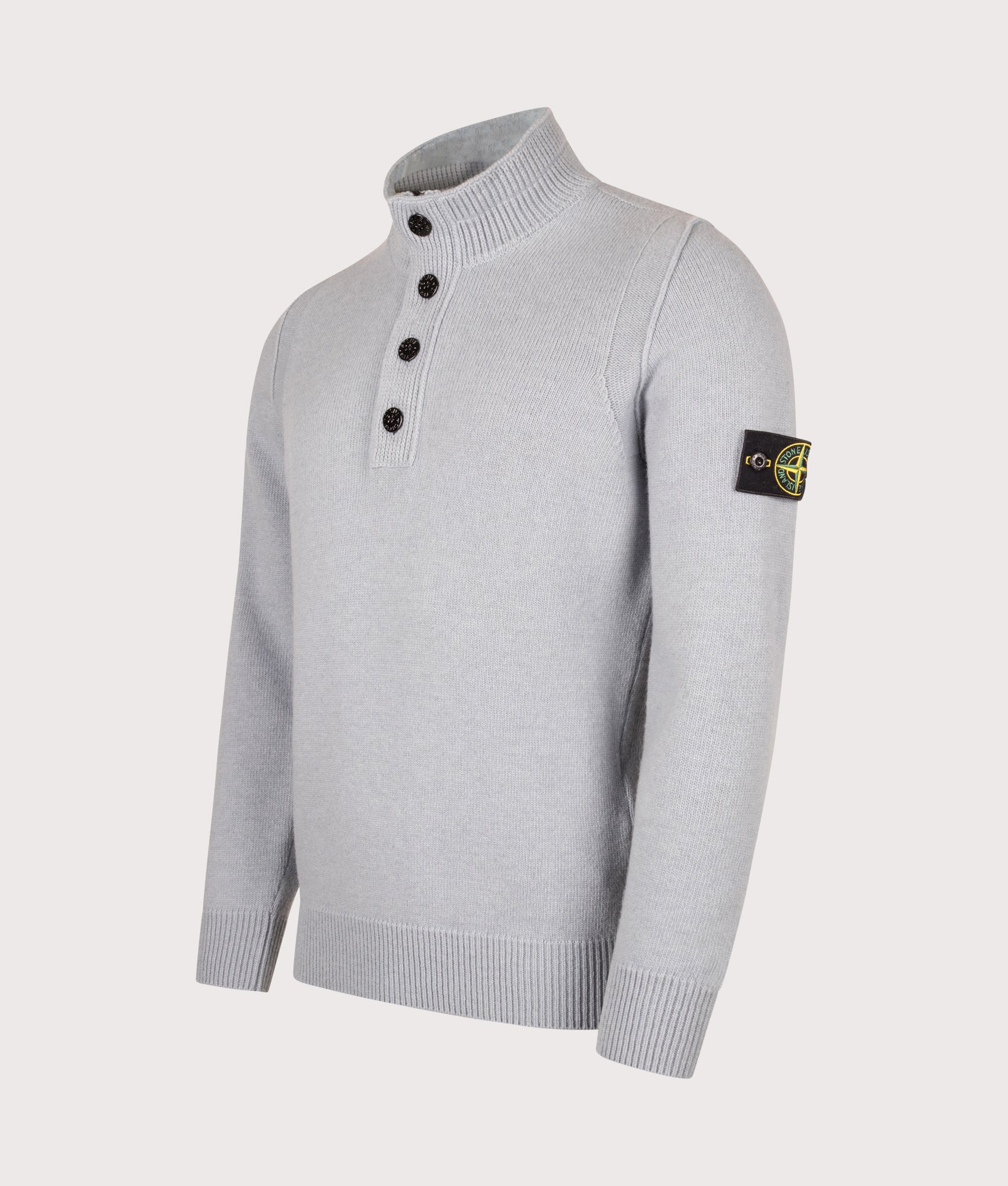 Stone Island Lambswool Button Up Jumper in Ash Grey at EQVVS Menswear. Angled front shot.