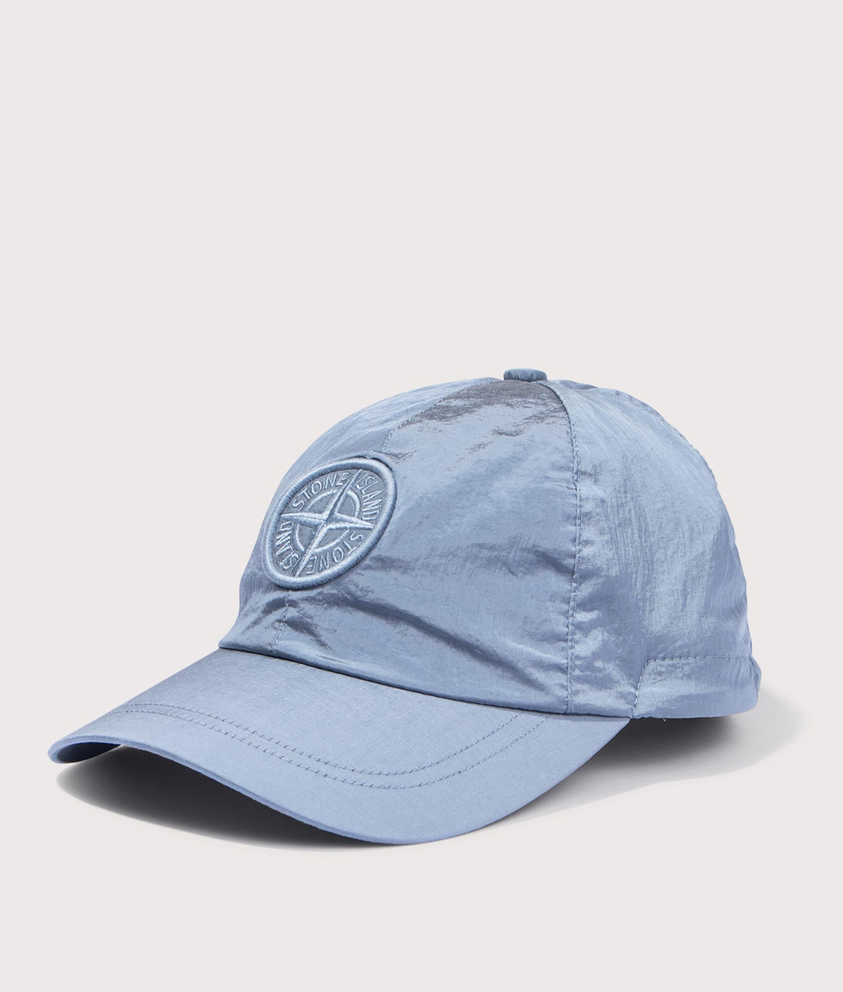 Stone Island Baseball cap in Dark Blue at EQVVS Menswear. Angled front shot.
