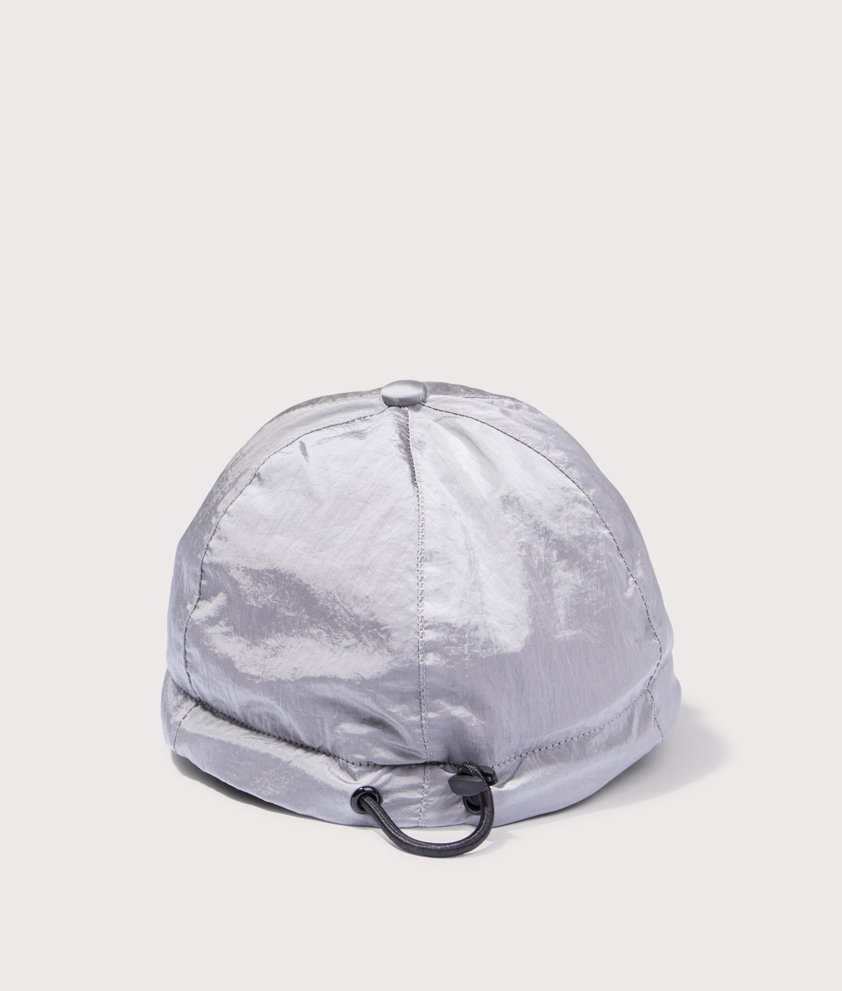 Stone Island Nylon Metal Baseball Cap in Pearl Grey at EQVVS Menswear. Back shot.