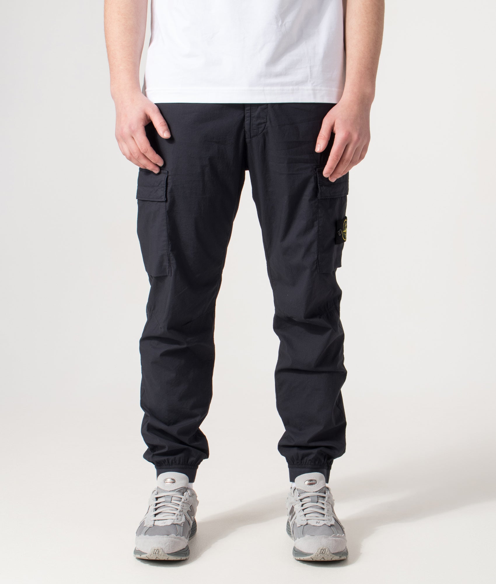 Stone Island Tapered Cargo Pants in Navy Blue at EQVVS Menswear. Front shot.