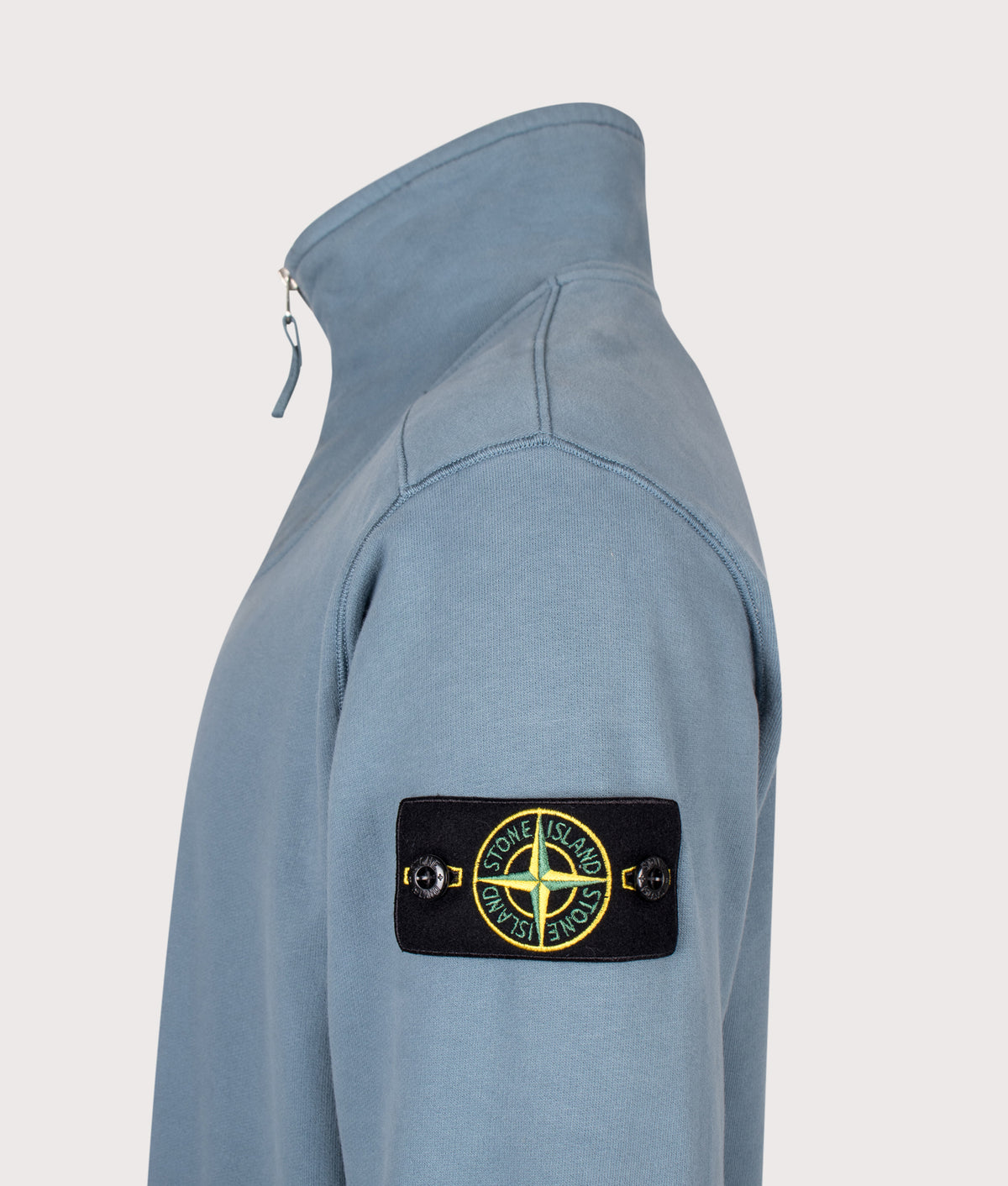 Stone Island Comfort Fit Brushed Organic Fleece Quarter Zip Sweatshirt in Steel Blue at EQVVS Menswear. Detail shot.